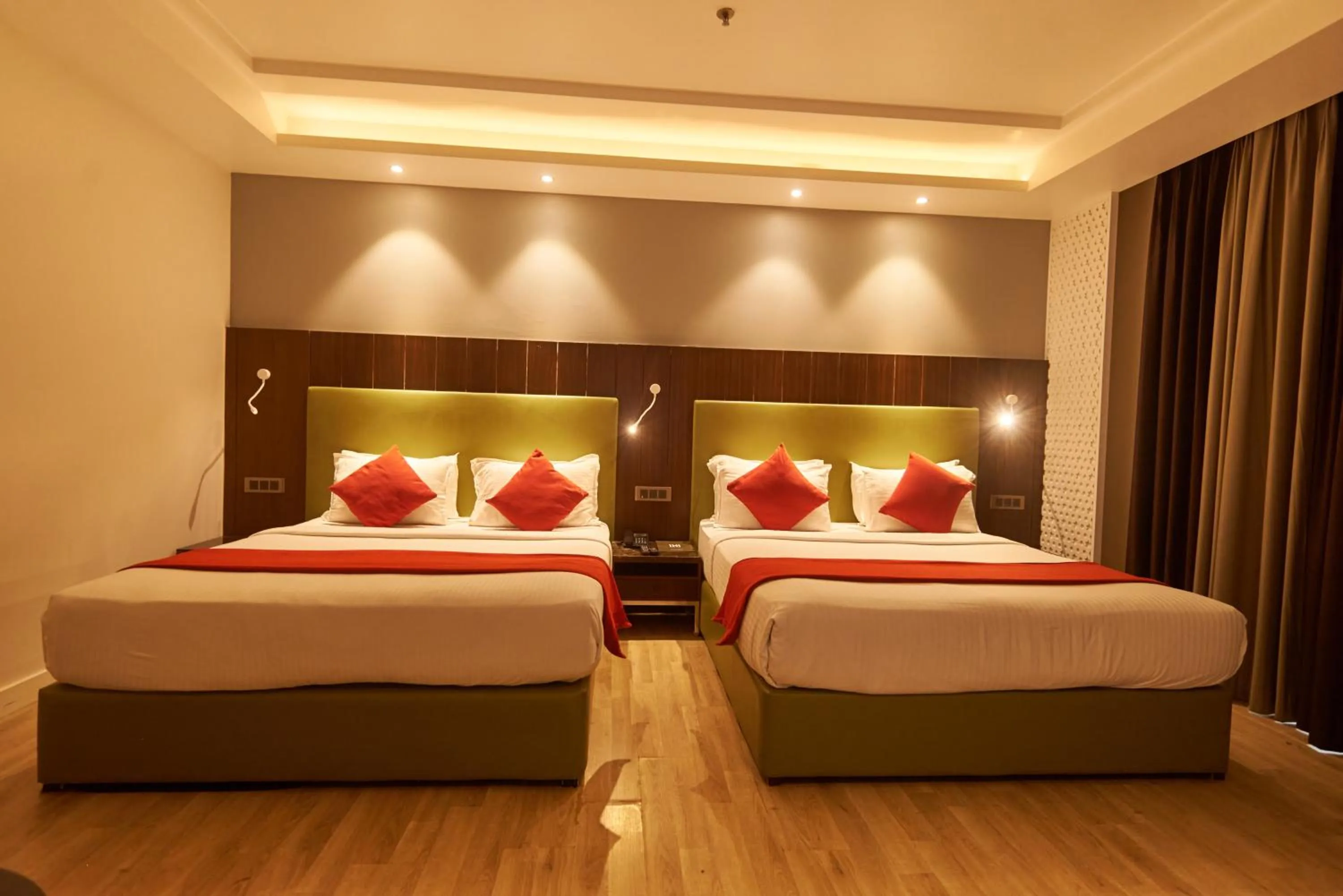 Bed in Tania President Inn