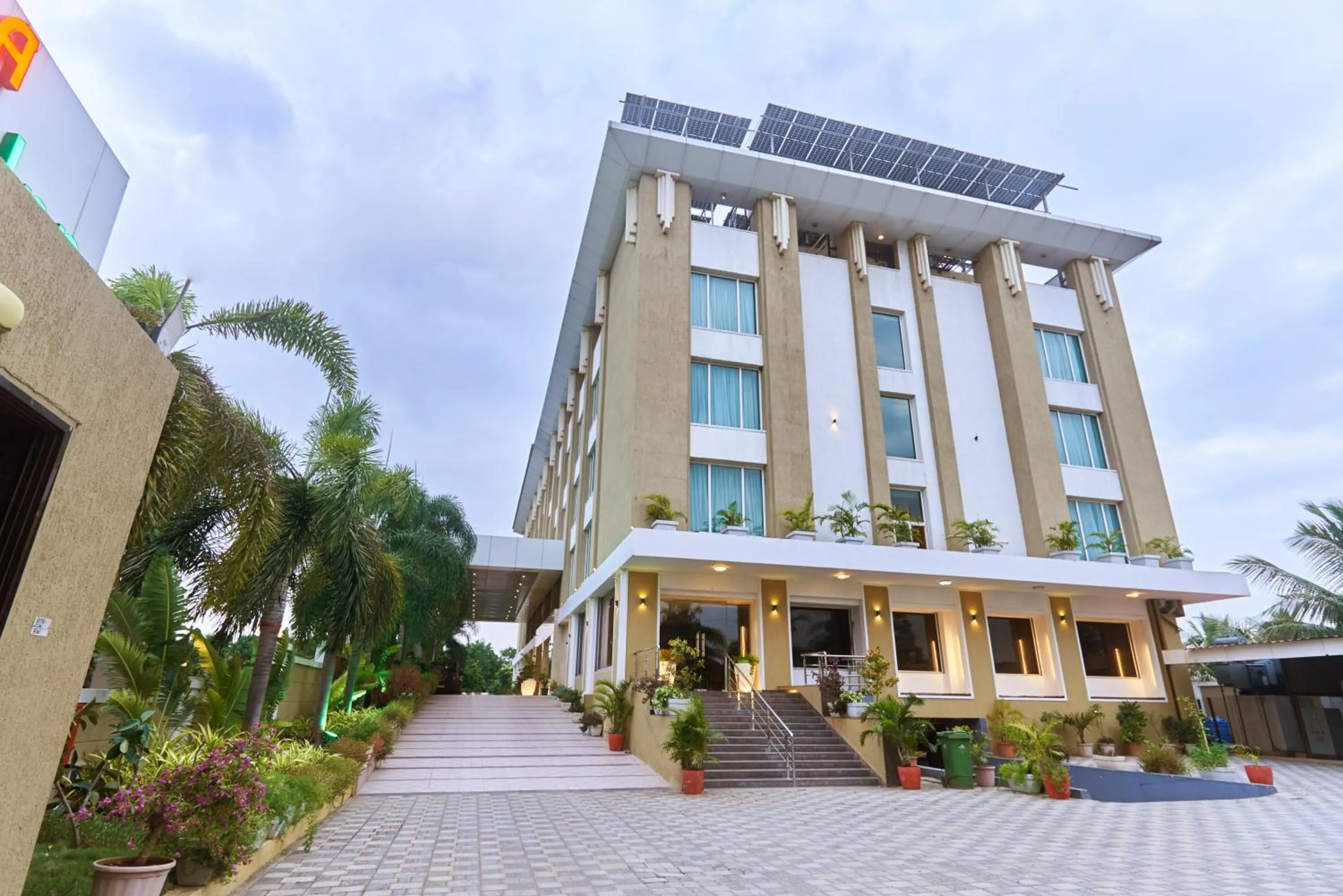 Property building in Tania President Inn