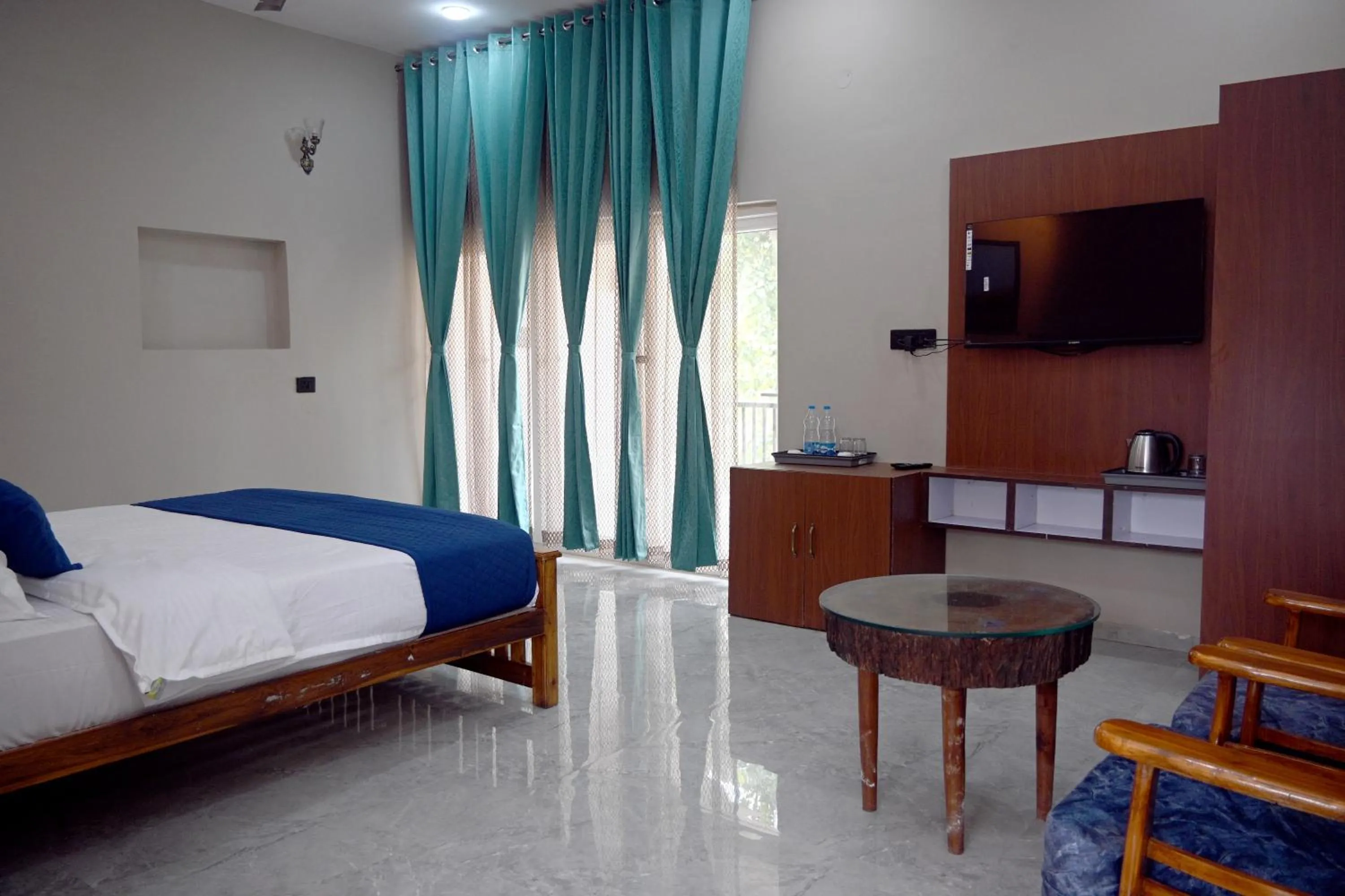 Bed in Bandhavgarh Tiger Resort