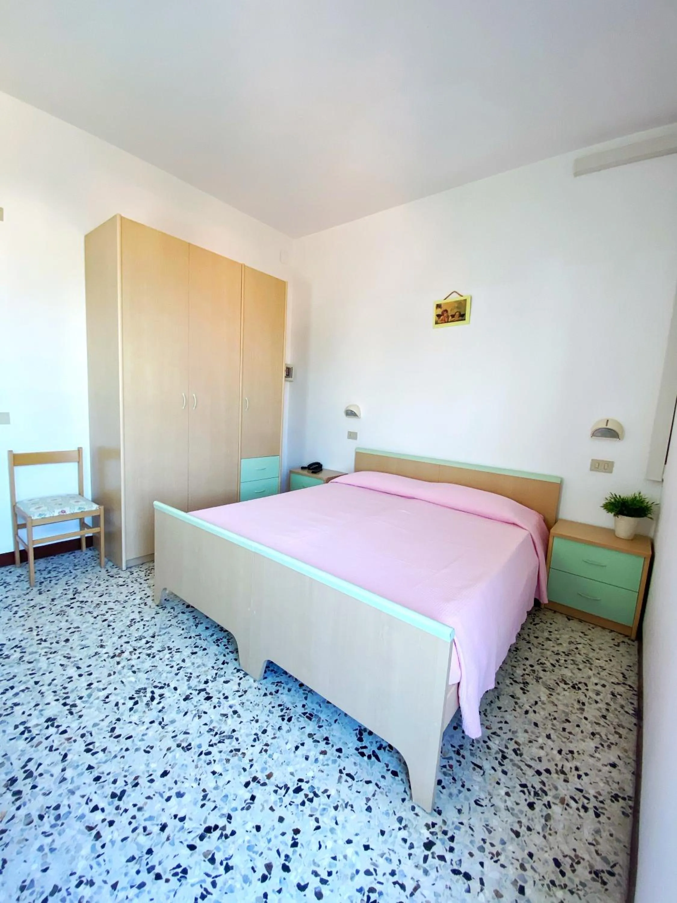 Bed in Hotel Dinarica