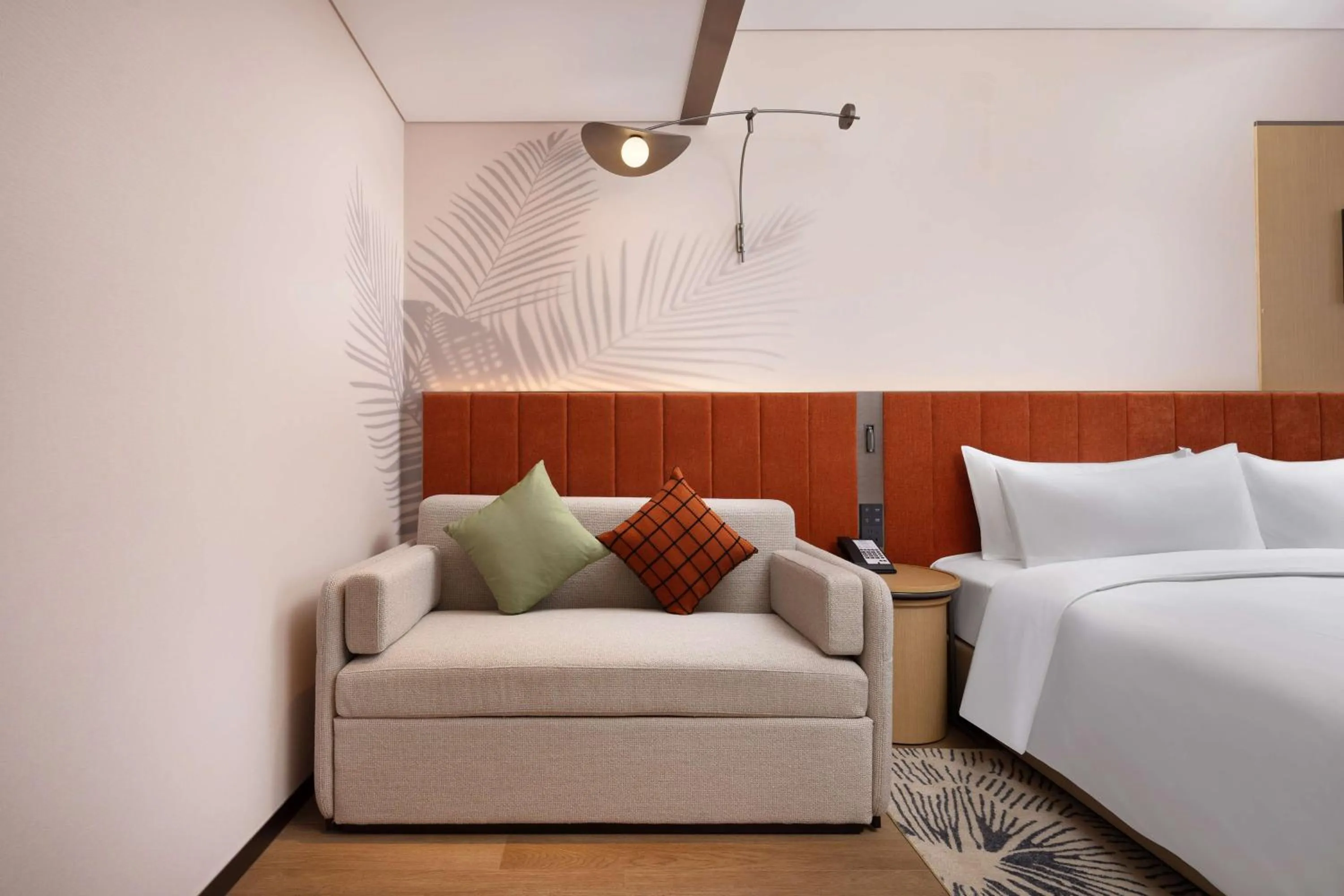 Living room, Bed in Hilton Garden Inn Harbin Haxi