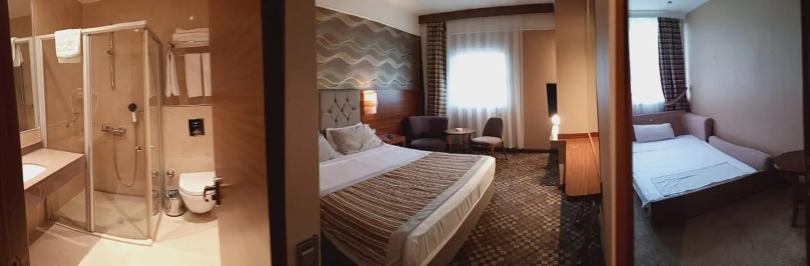 Bed in Adranos Hotel