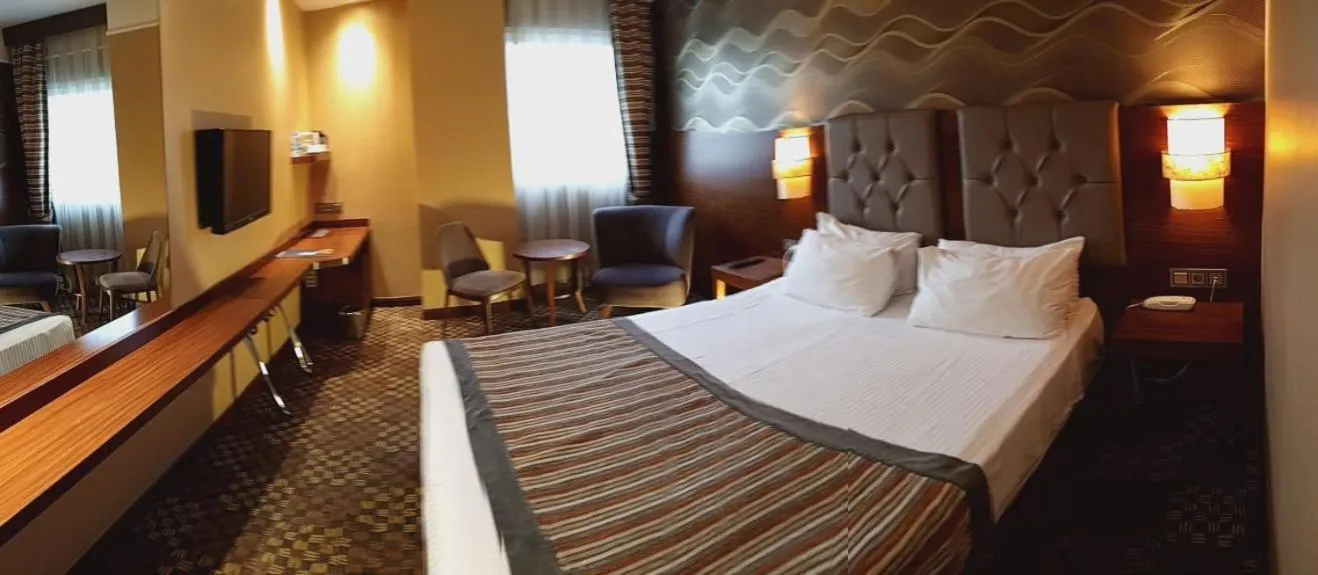 Bed in Adranos Hotel