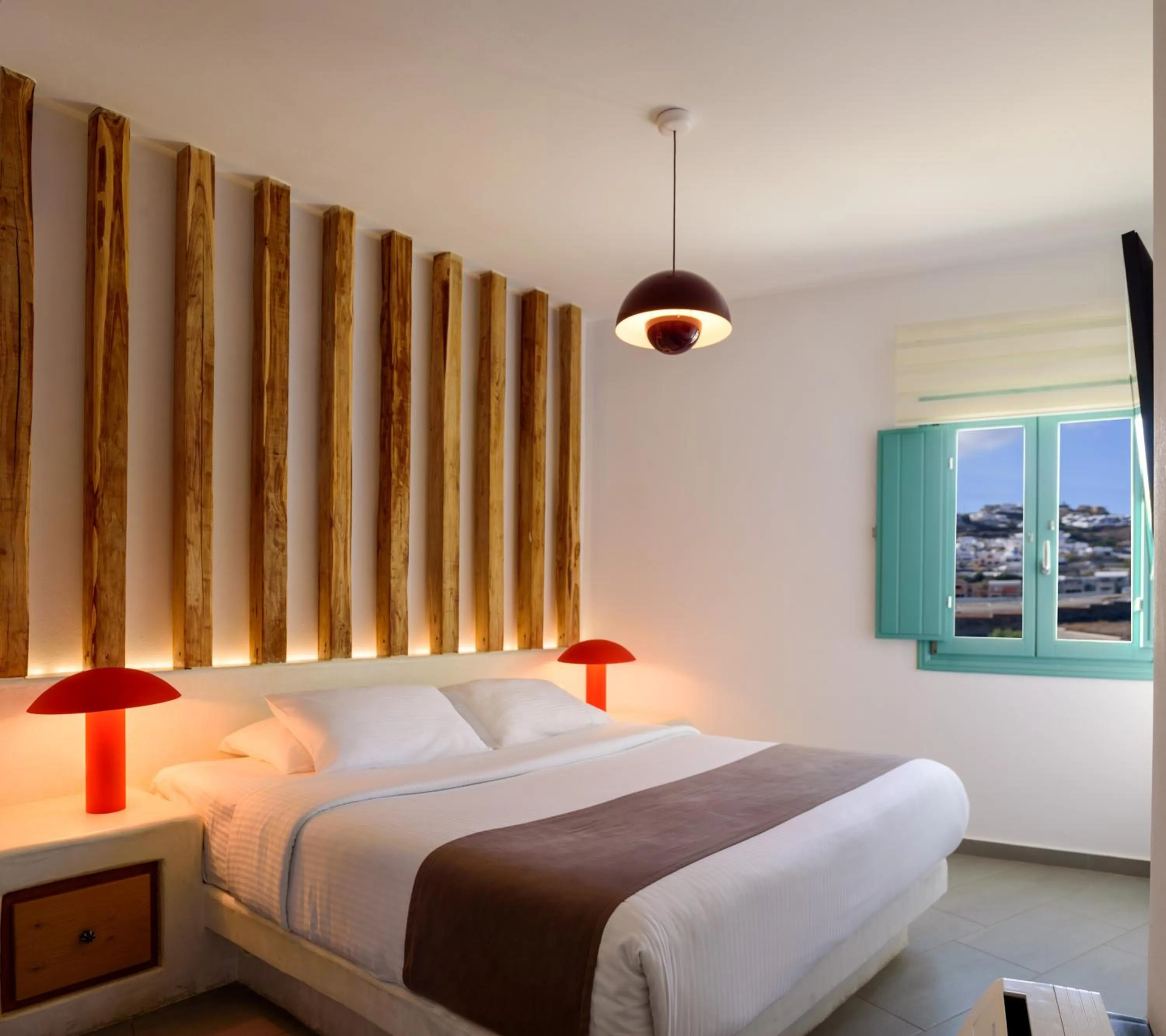 Bed in Neptune Luxury Suites