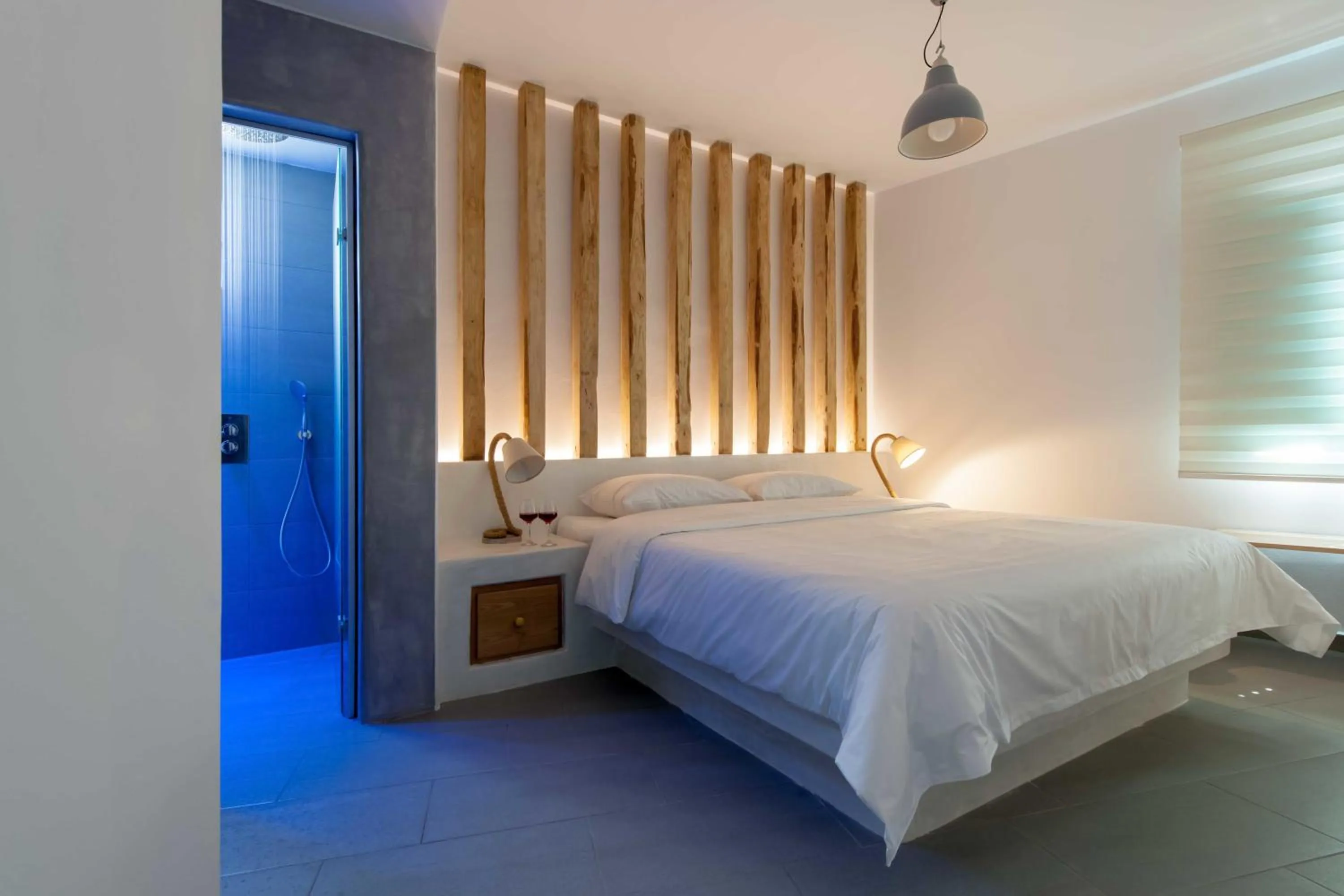 Shower, Bed in Neptune Luxury Suites