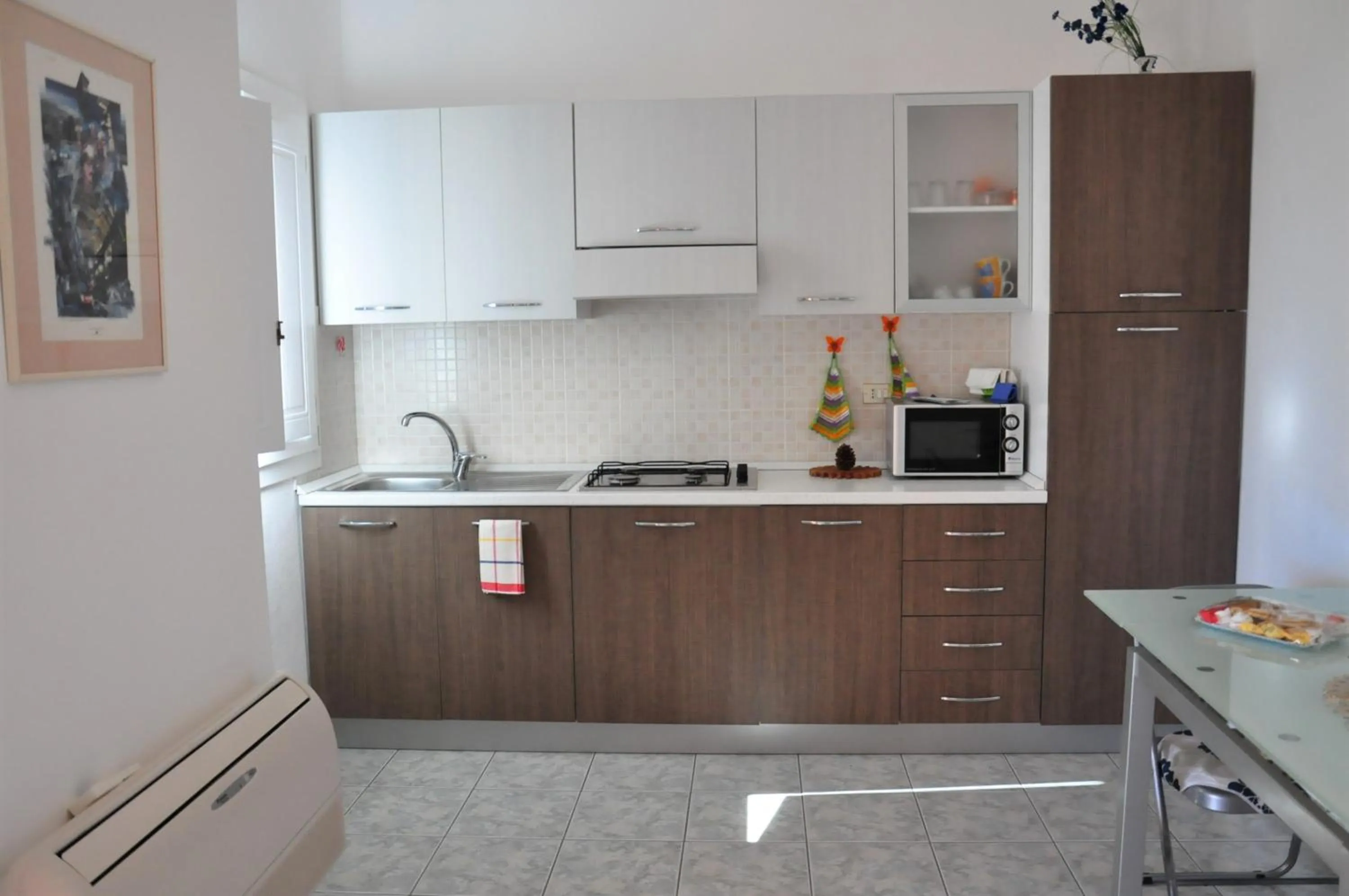 Kitchen or kitchenette in Sa Teria Village - Appartamenti -