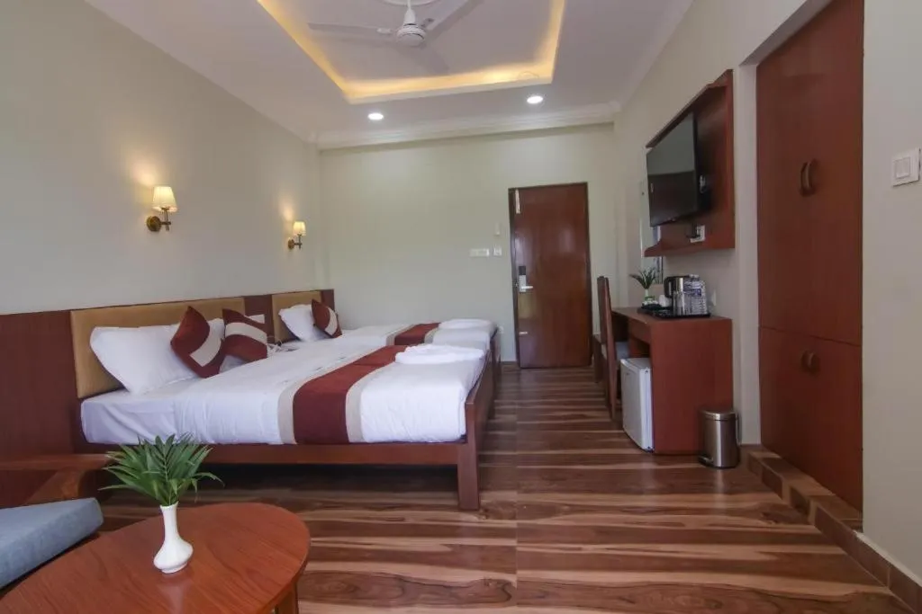 Bed in Hotel Yatra Sauraha Pvt Ltd