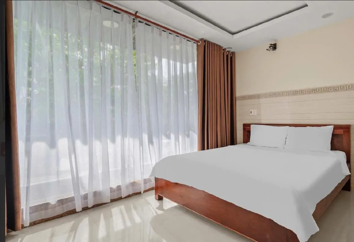 Bed in Bear Hotel & Homestay