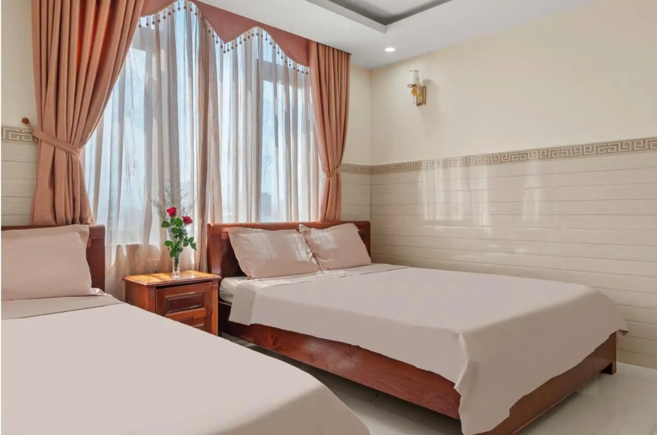 Bed in Bear Hotel & Homestay