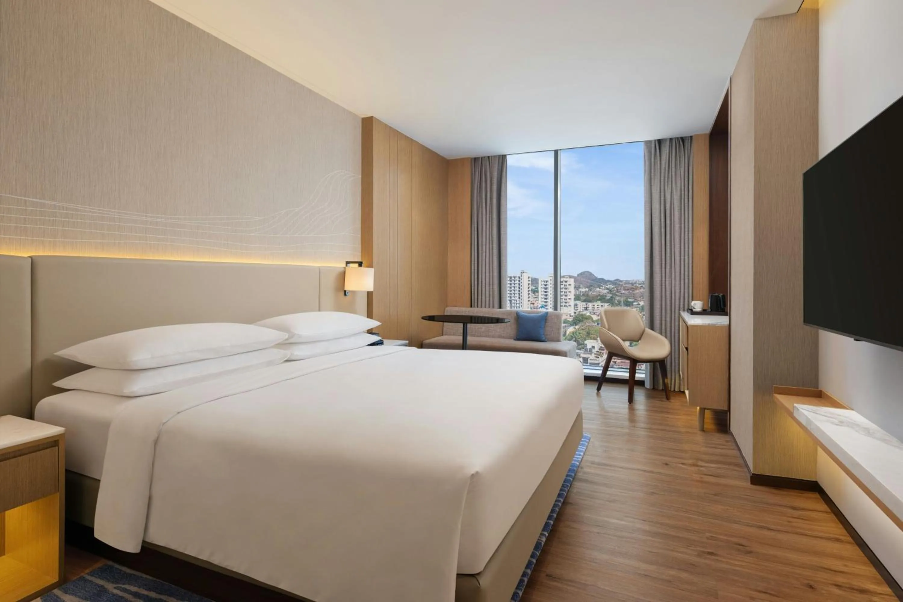 Photo of the whole room, Bed in Courtyard by Marriott Ranchi