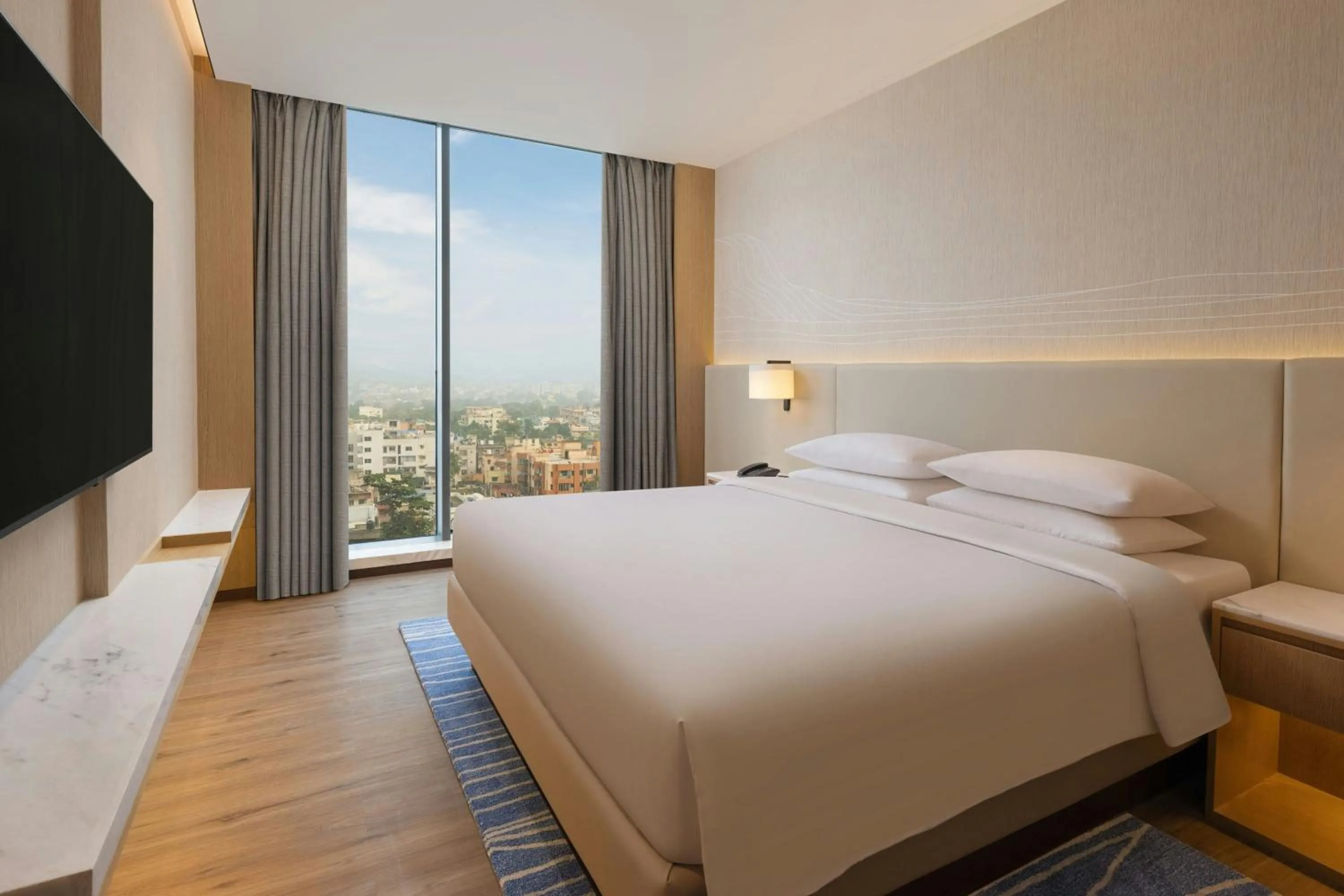 Photo of the whole room, Bed in Courtyard by Marriott Ranchi