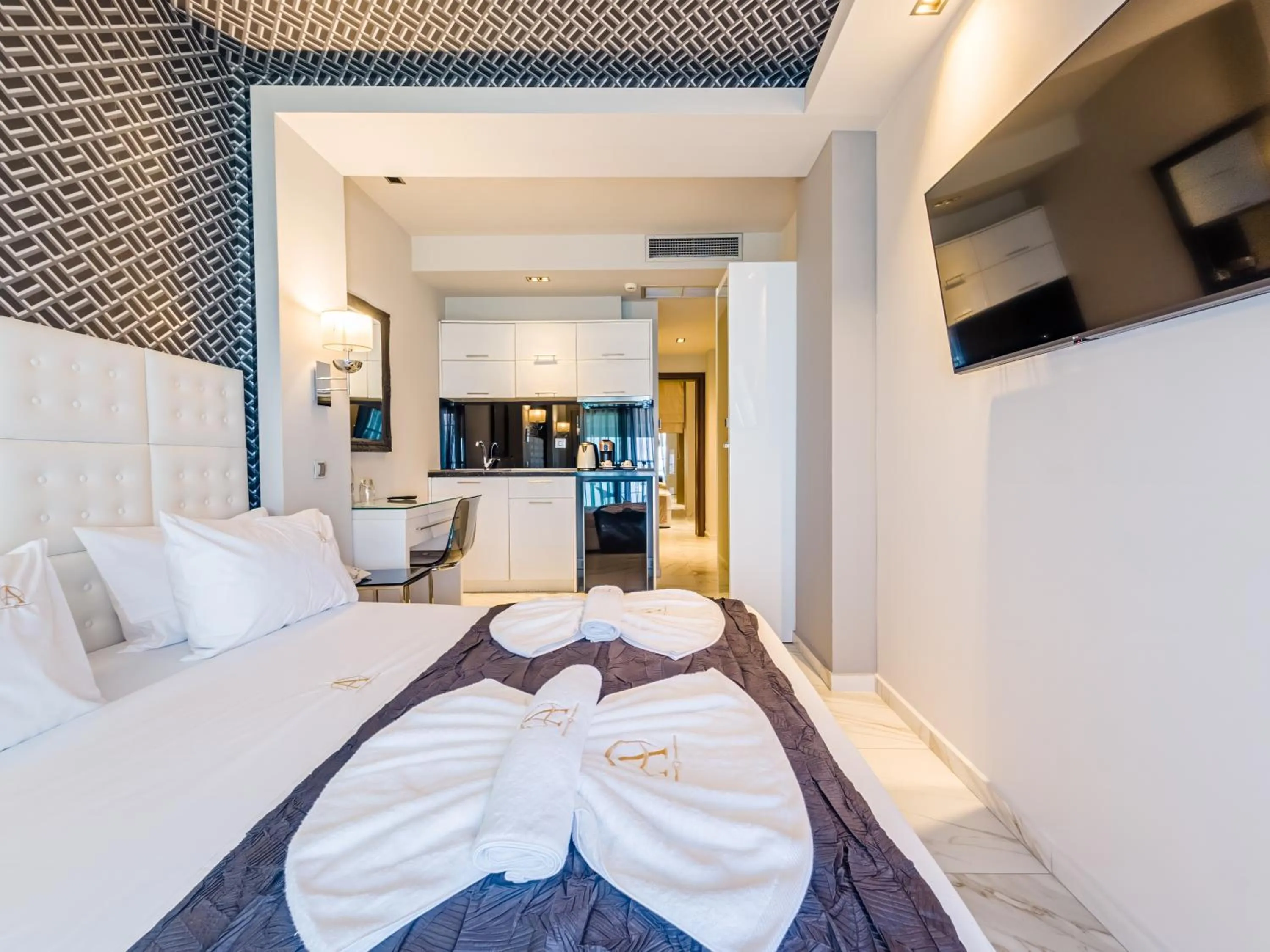 TV and multimedia, Bed in Alpha Luxury Suites