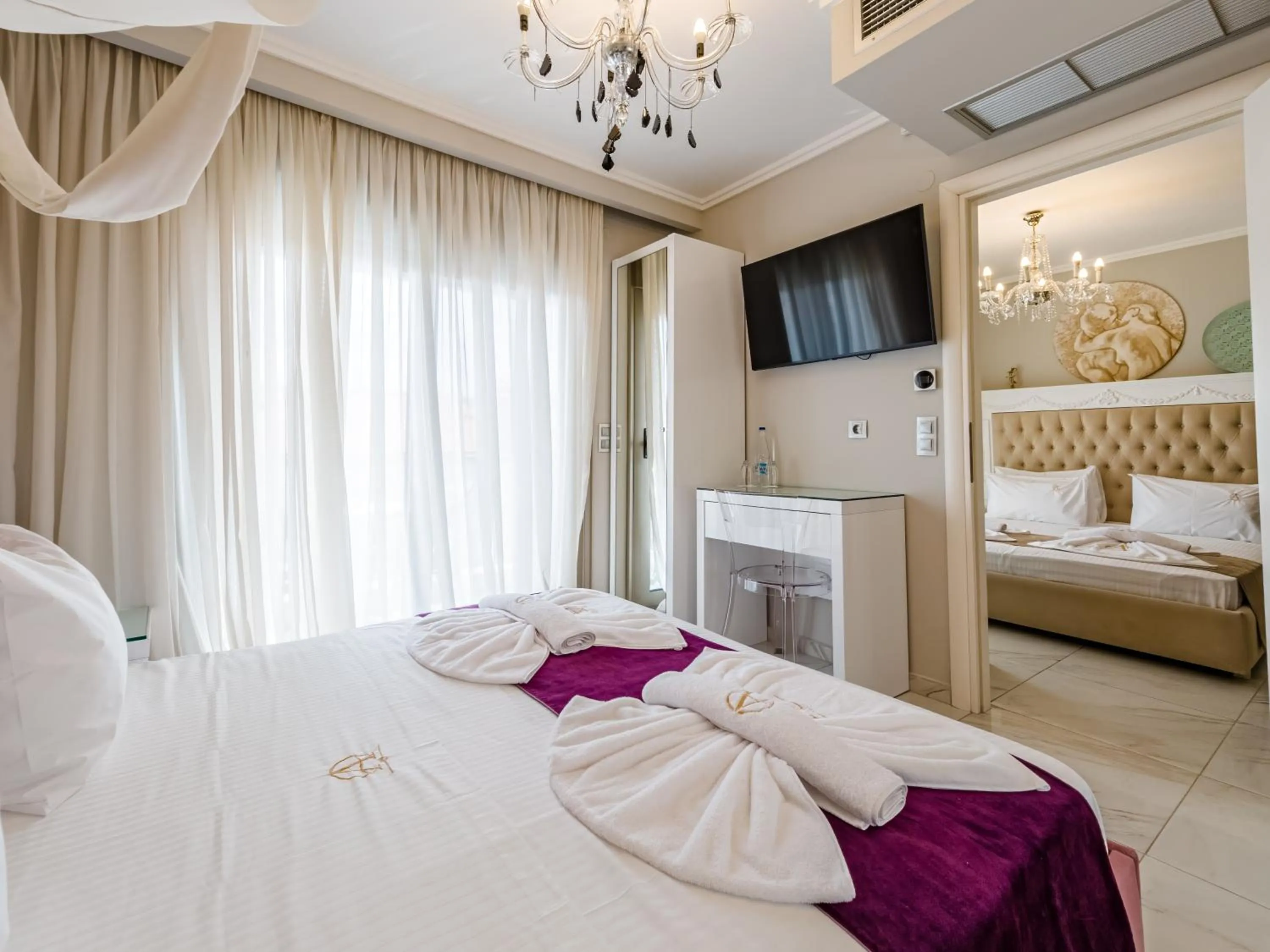 Bed in Alpha Luxury Suites