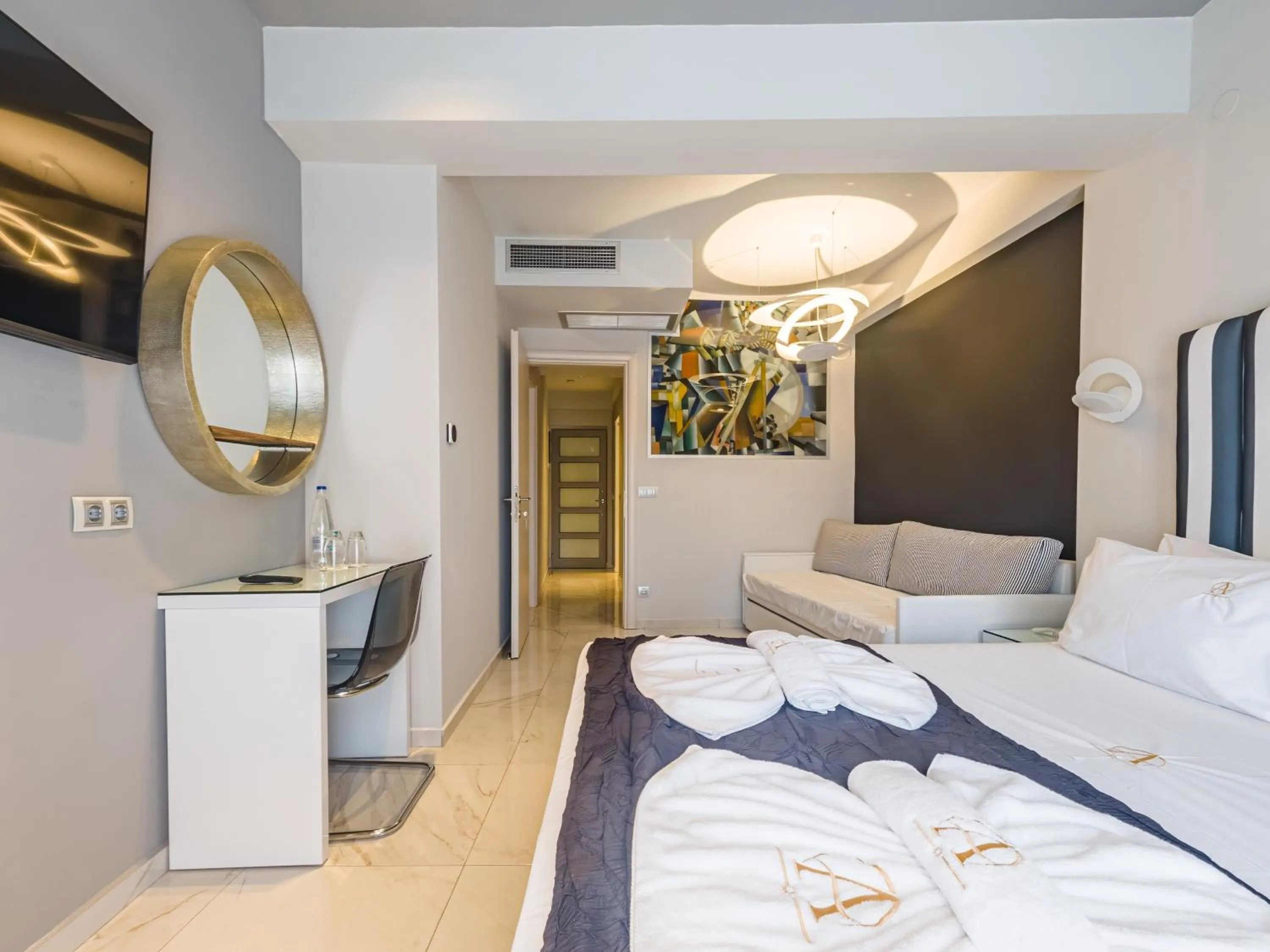 Bed in Alpha Luxury Suites