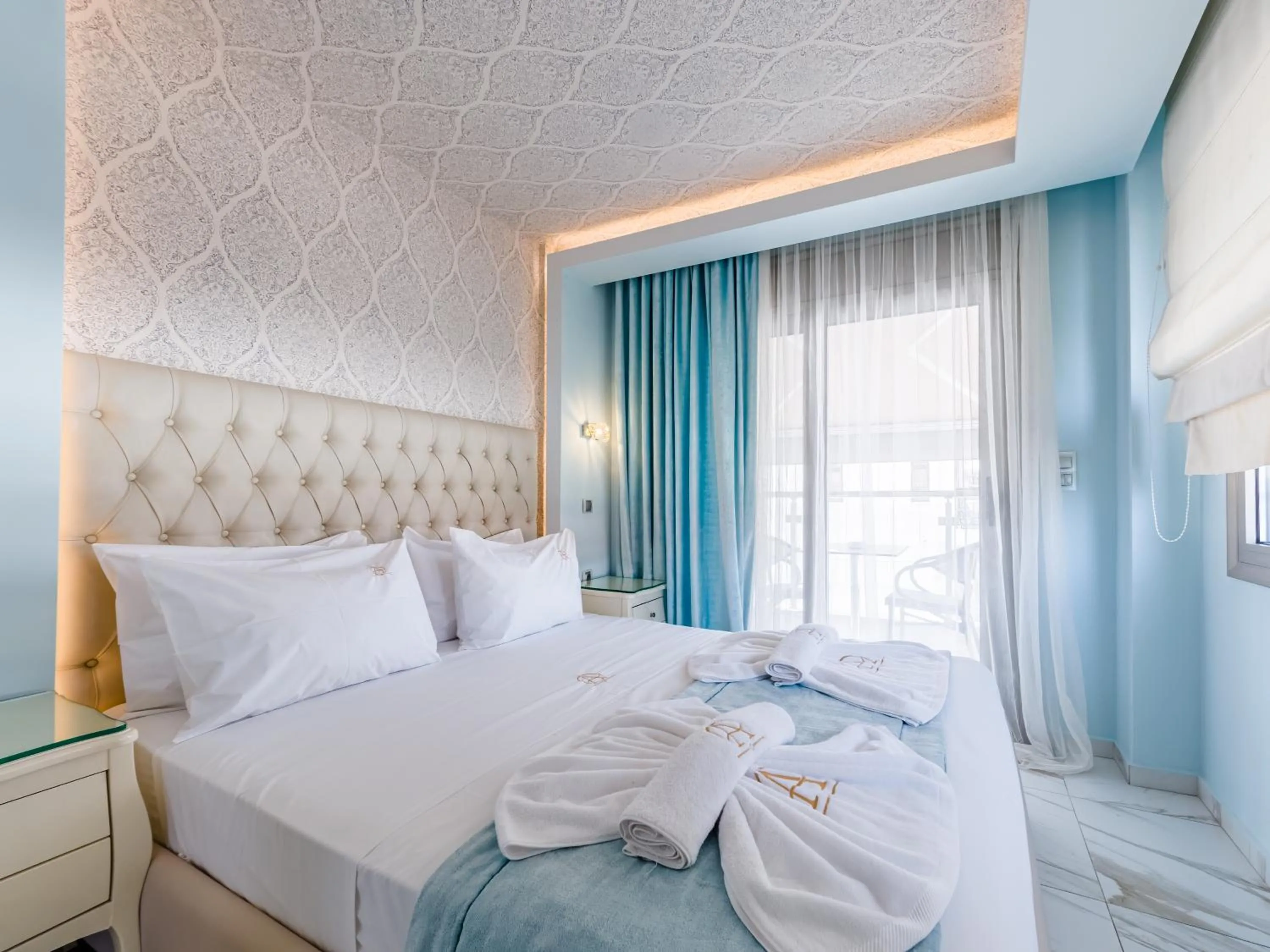 Bed in Alpha Luxury Suites