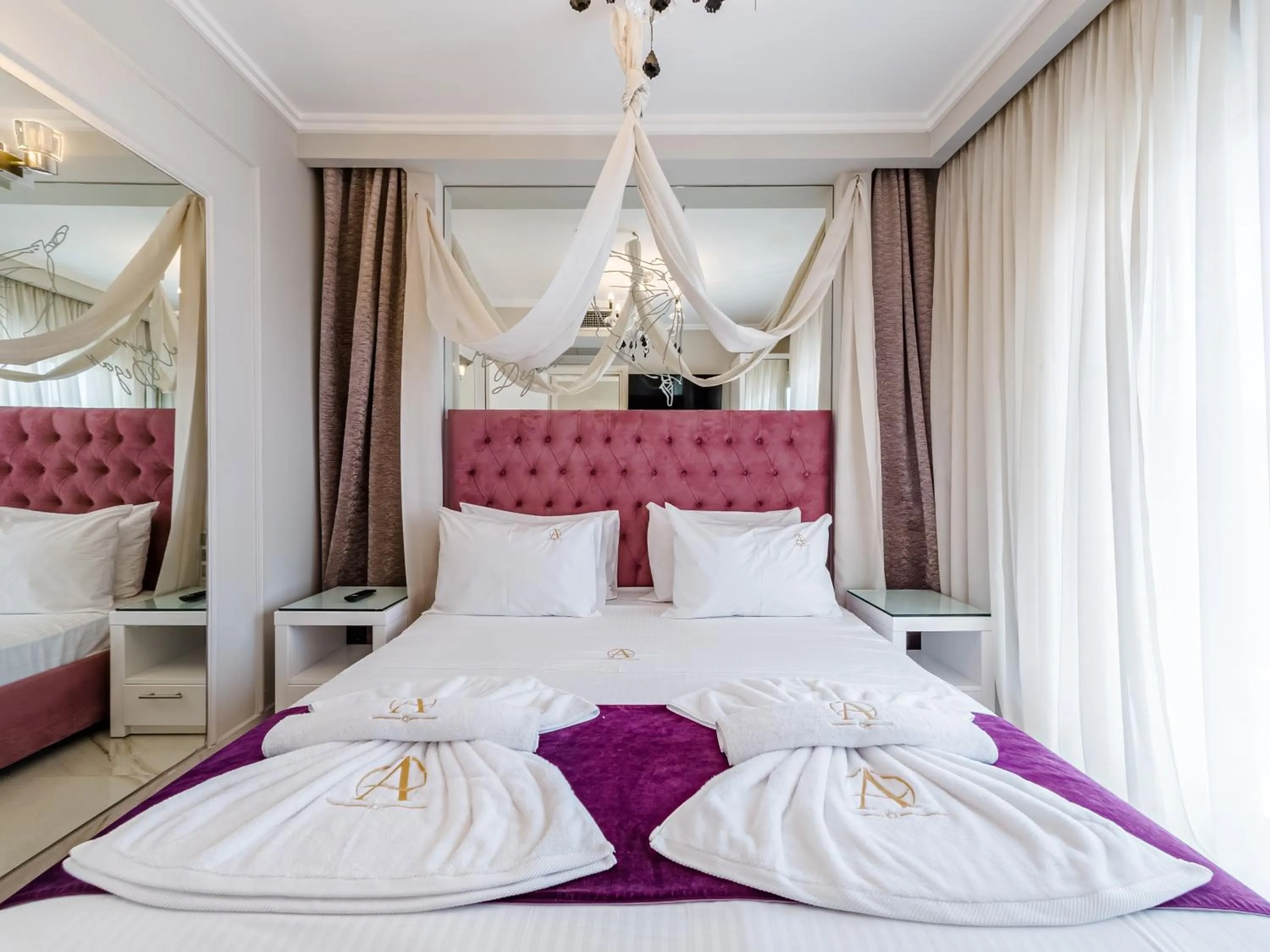 Bed in Alpha Luxury Suites