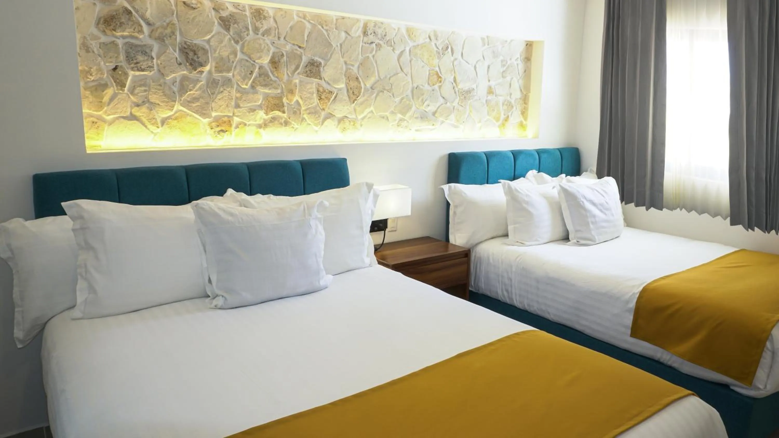 Bed in Hotel Loreto Palmar