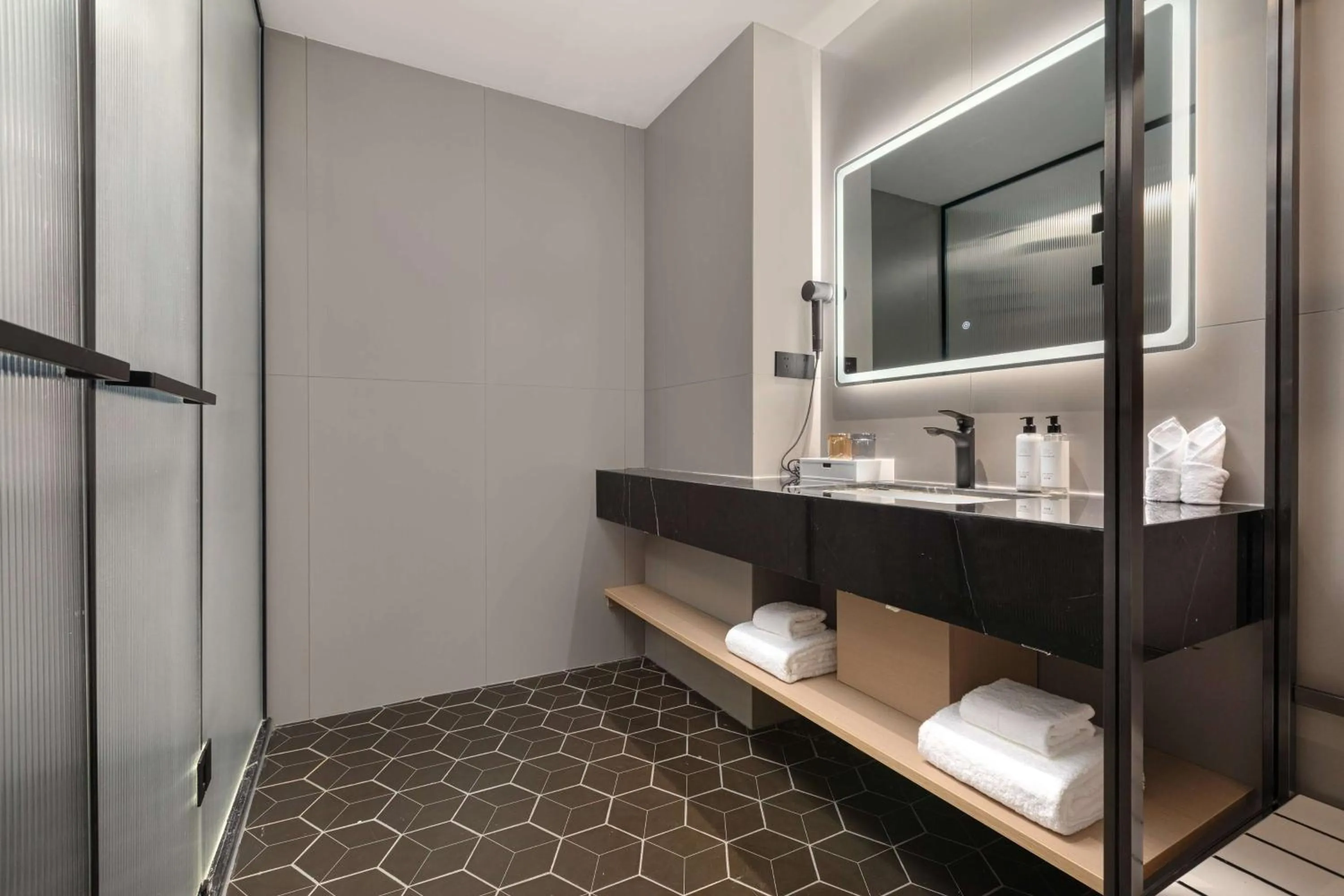 Bathroom in Microtel by Wyndham Xian Beilin