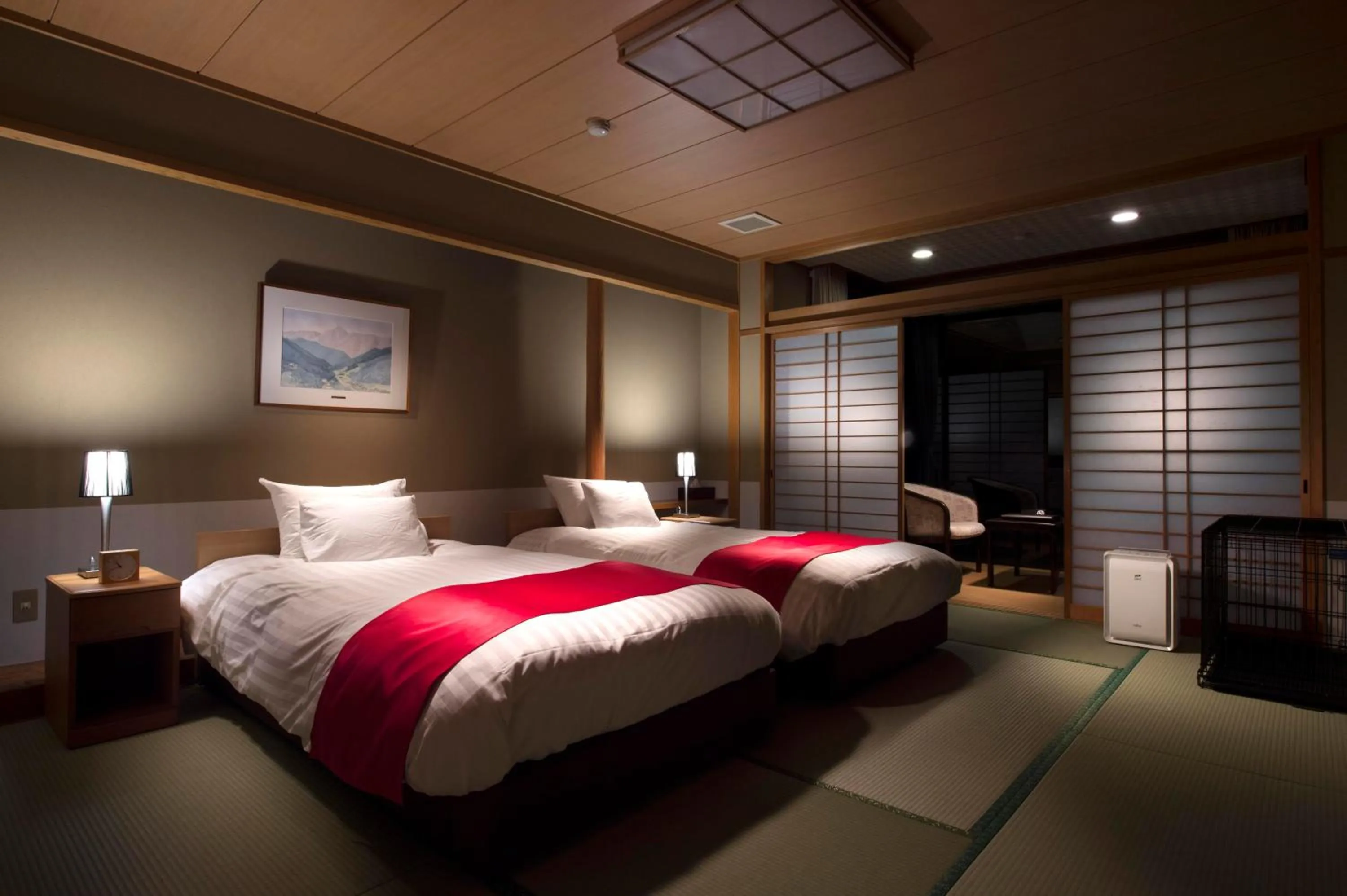 Bed in Matsusaka Wan Wan Paradise Forest Hotel