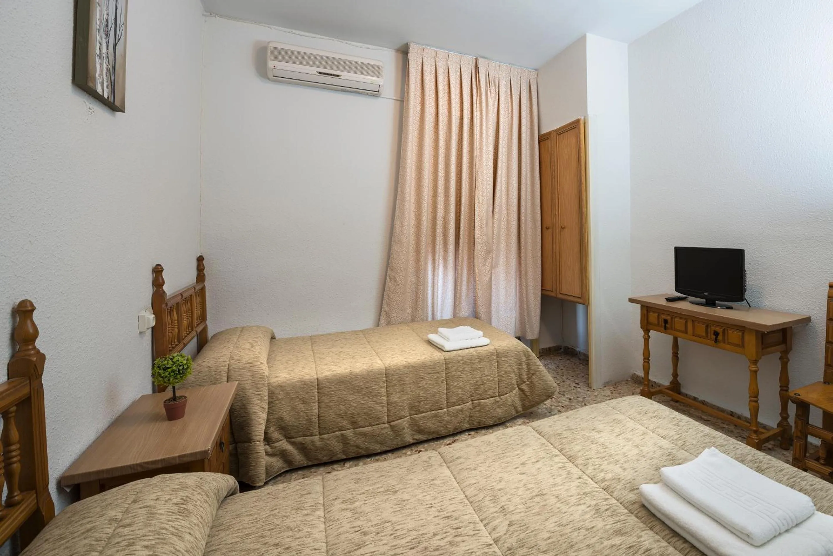 Photo of the whole room, Bed in Hostal Santa Barbara