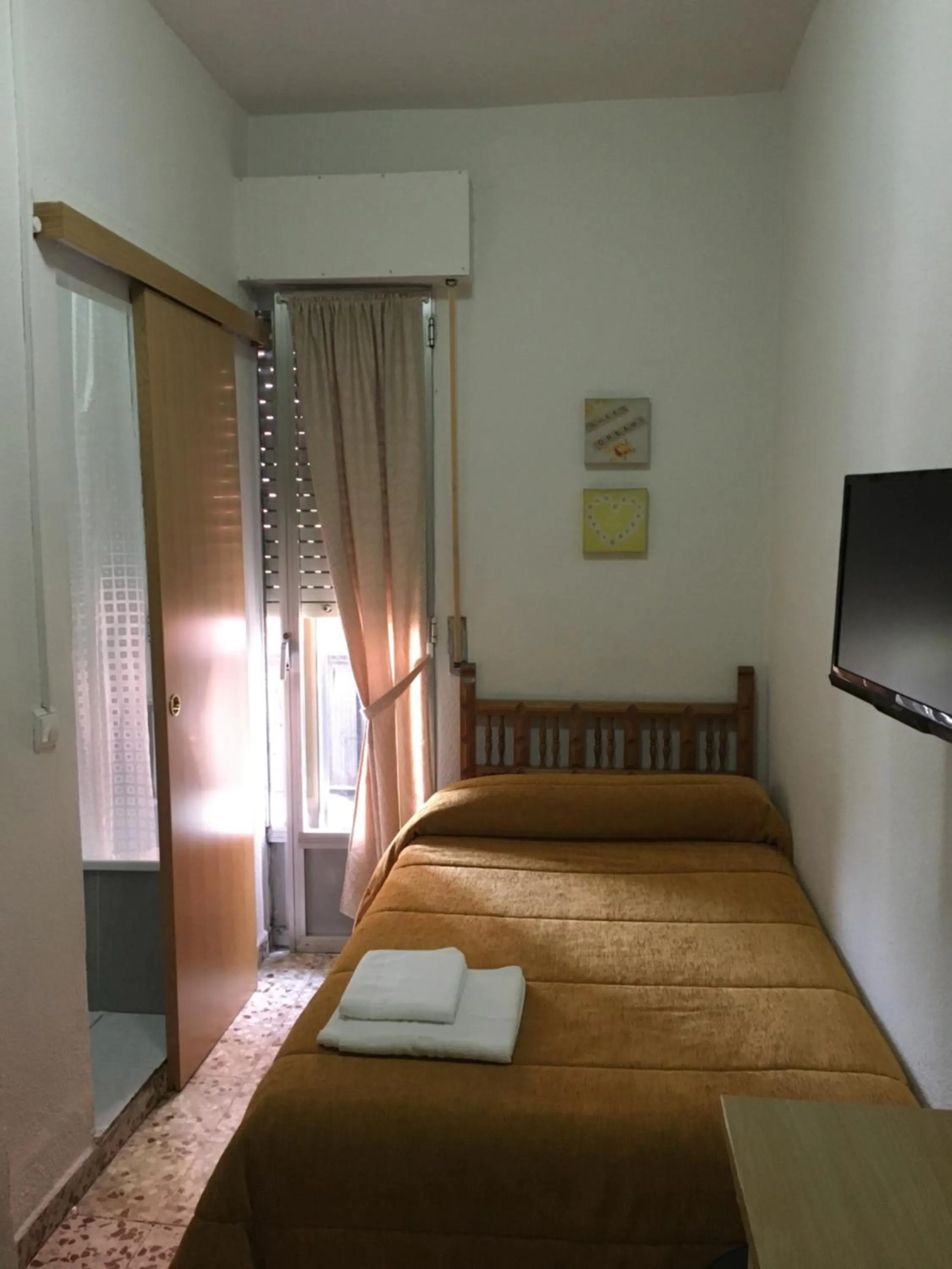 Photo of the whole room, Bed in Hostal Santa Barbara