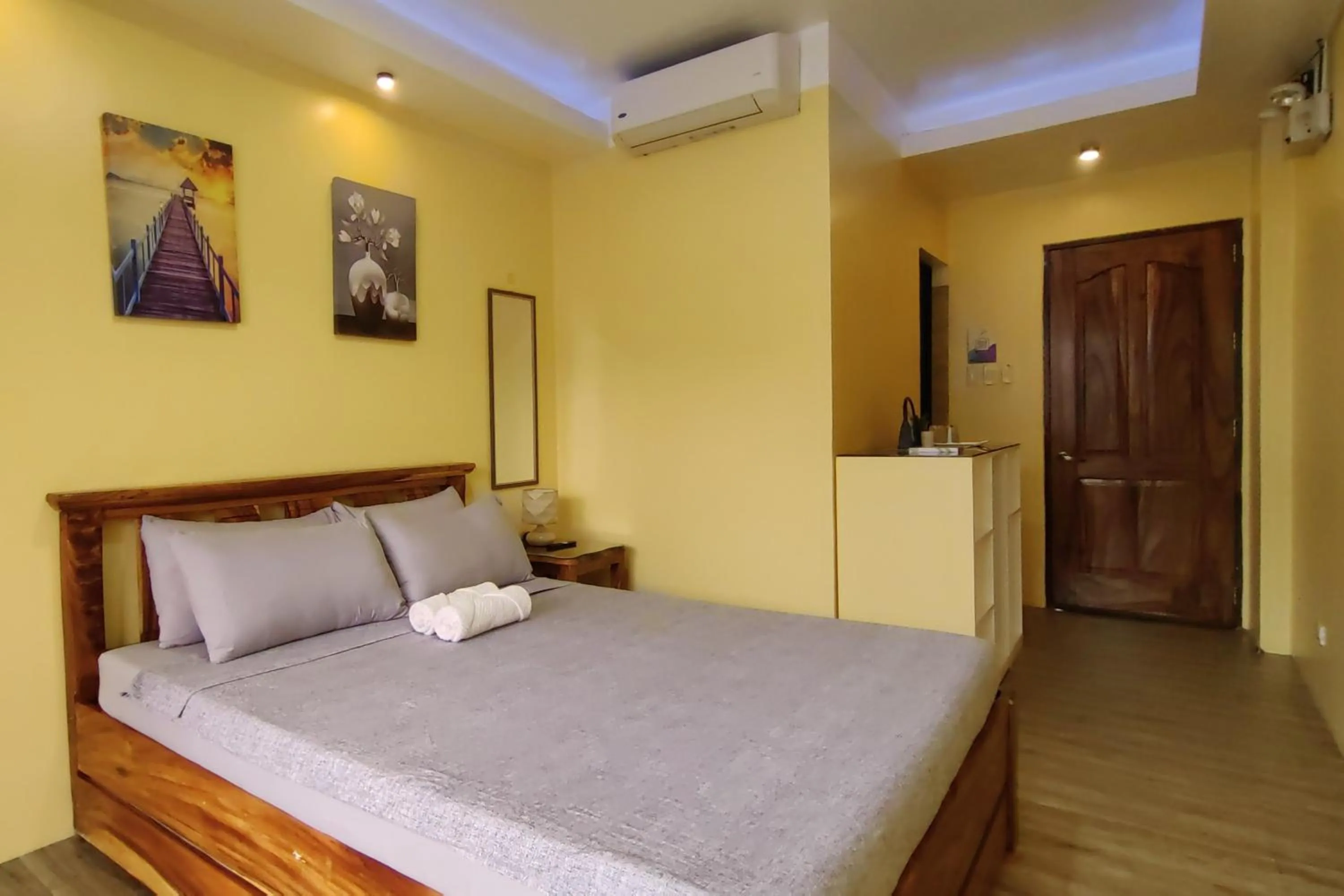 Bed in Inn Ka Kay Mame near SM City Puerto Princesa