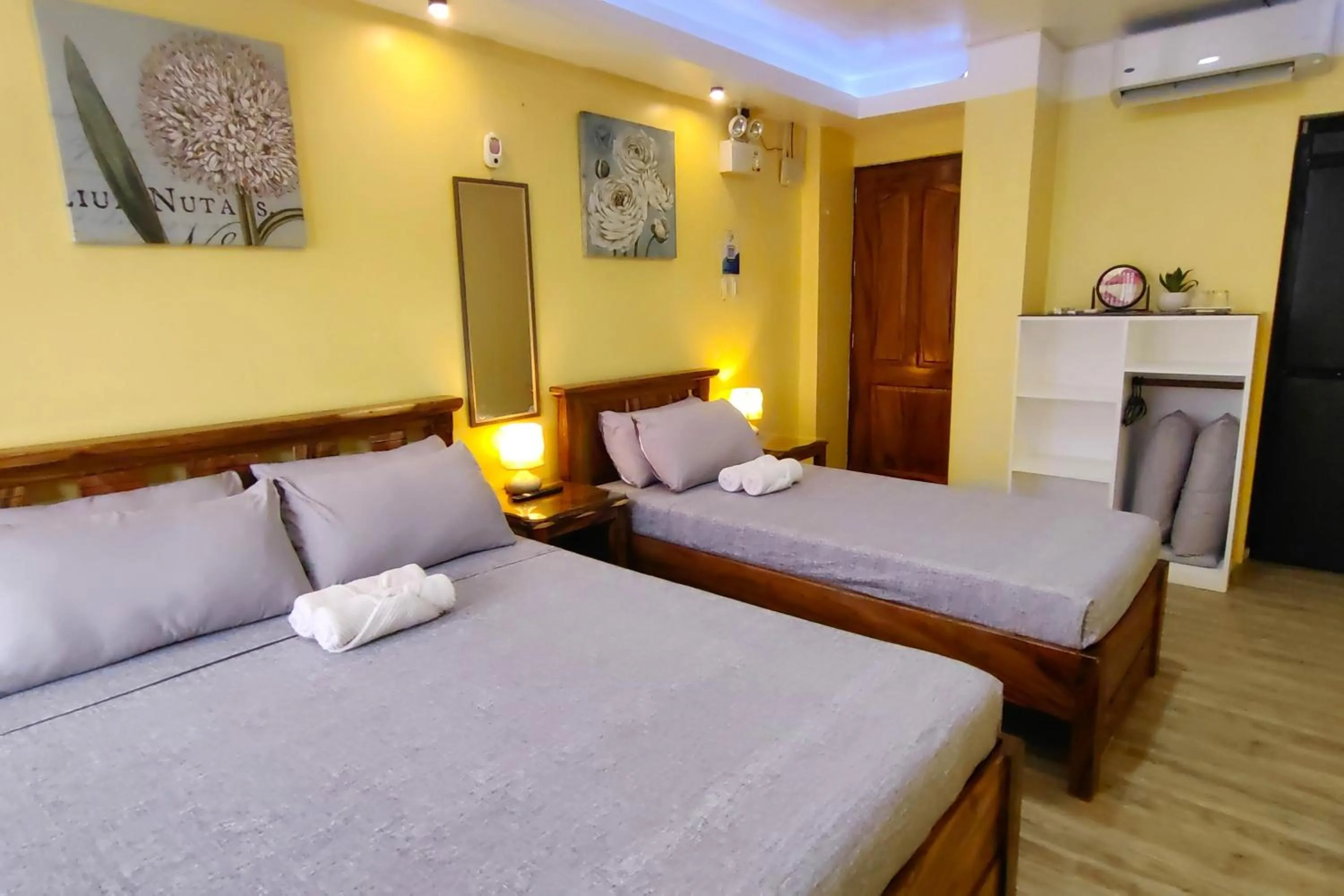 Bed in Inn Ka Kay Mame near SM City Puerto Princesa