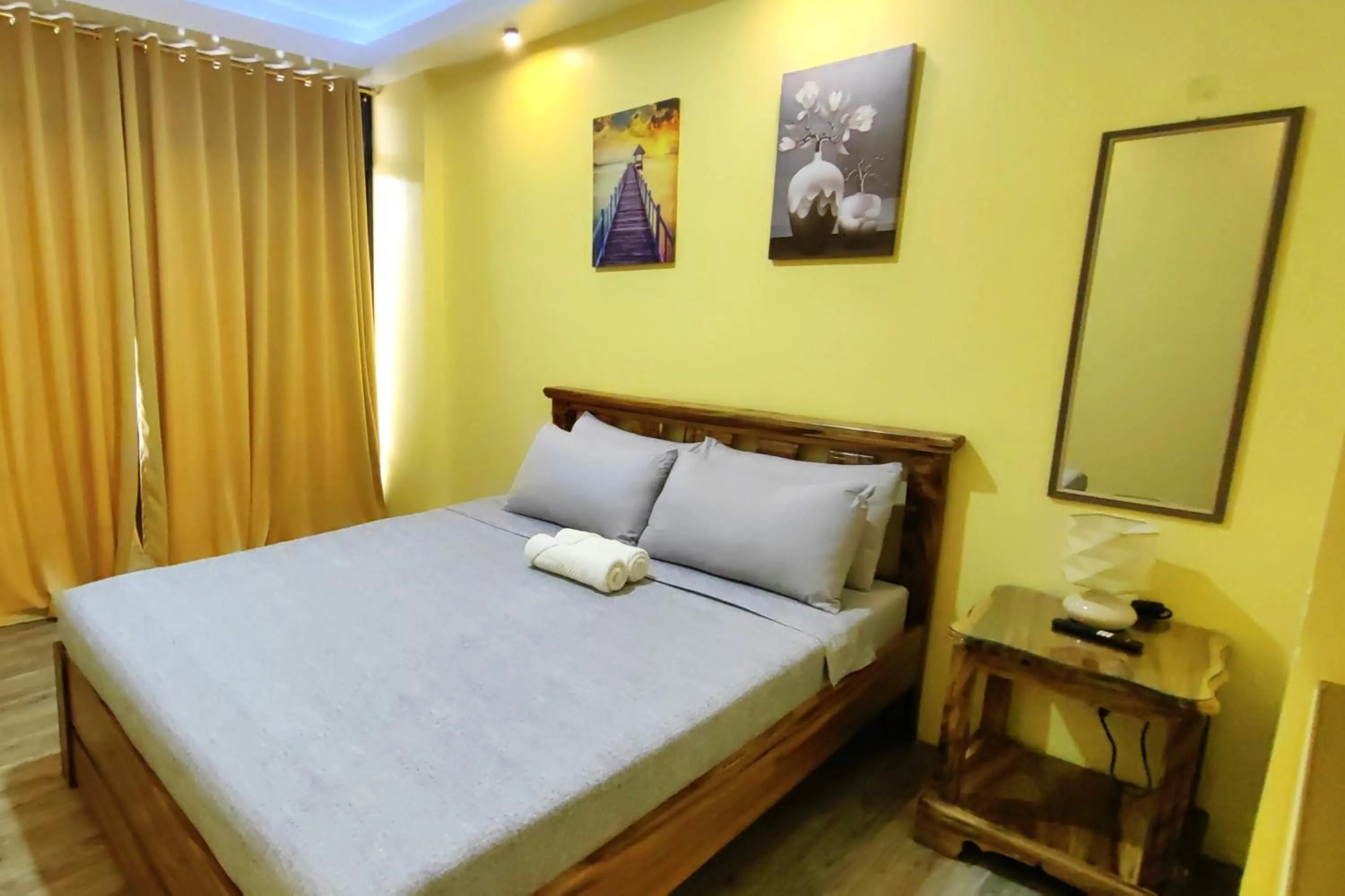 Bed in Inn Ka Kay Mame near SM City Puerto Princesa