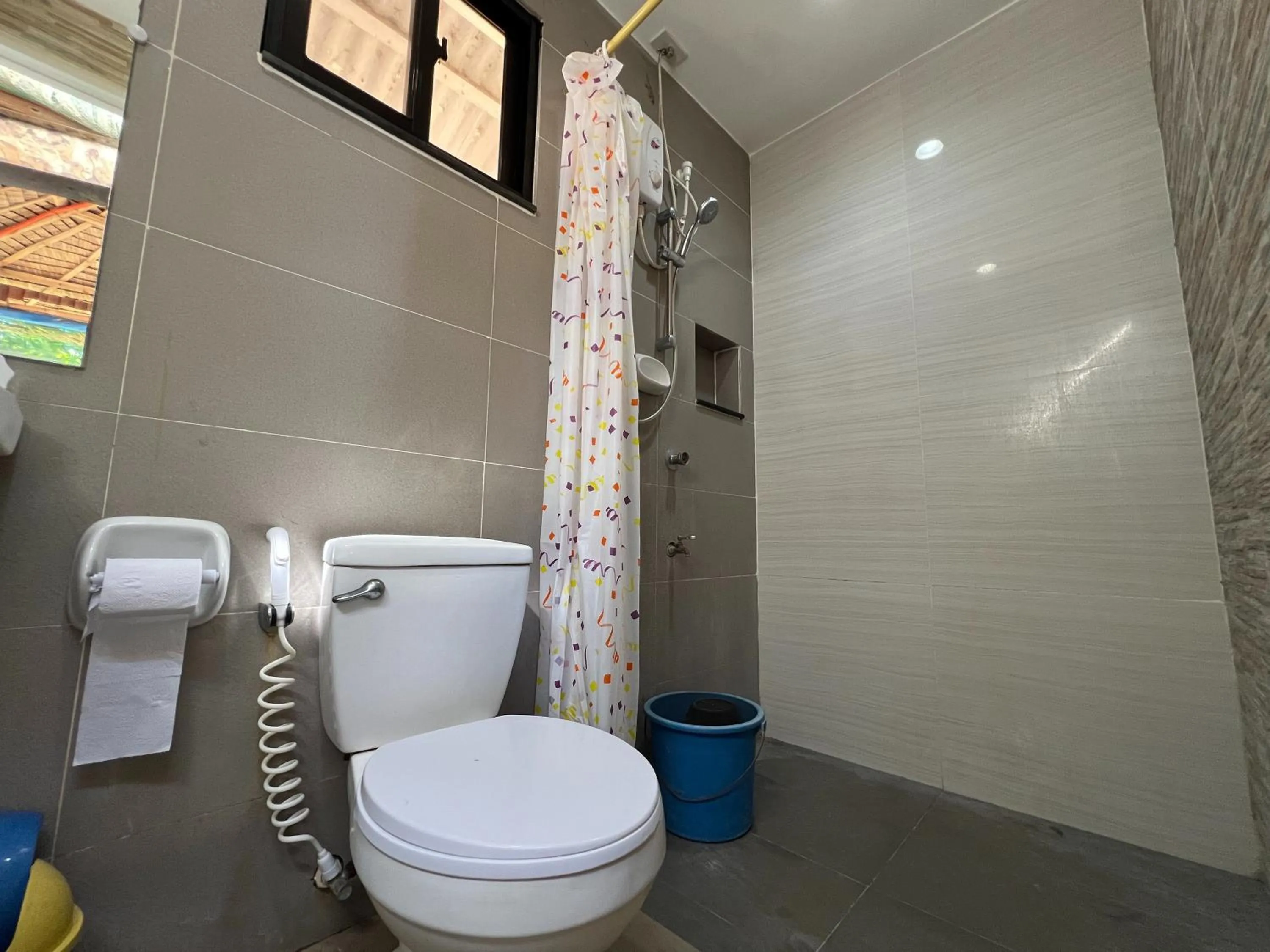 Bathroom in Lumiere Beachfront Resort