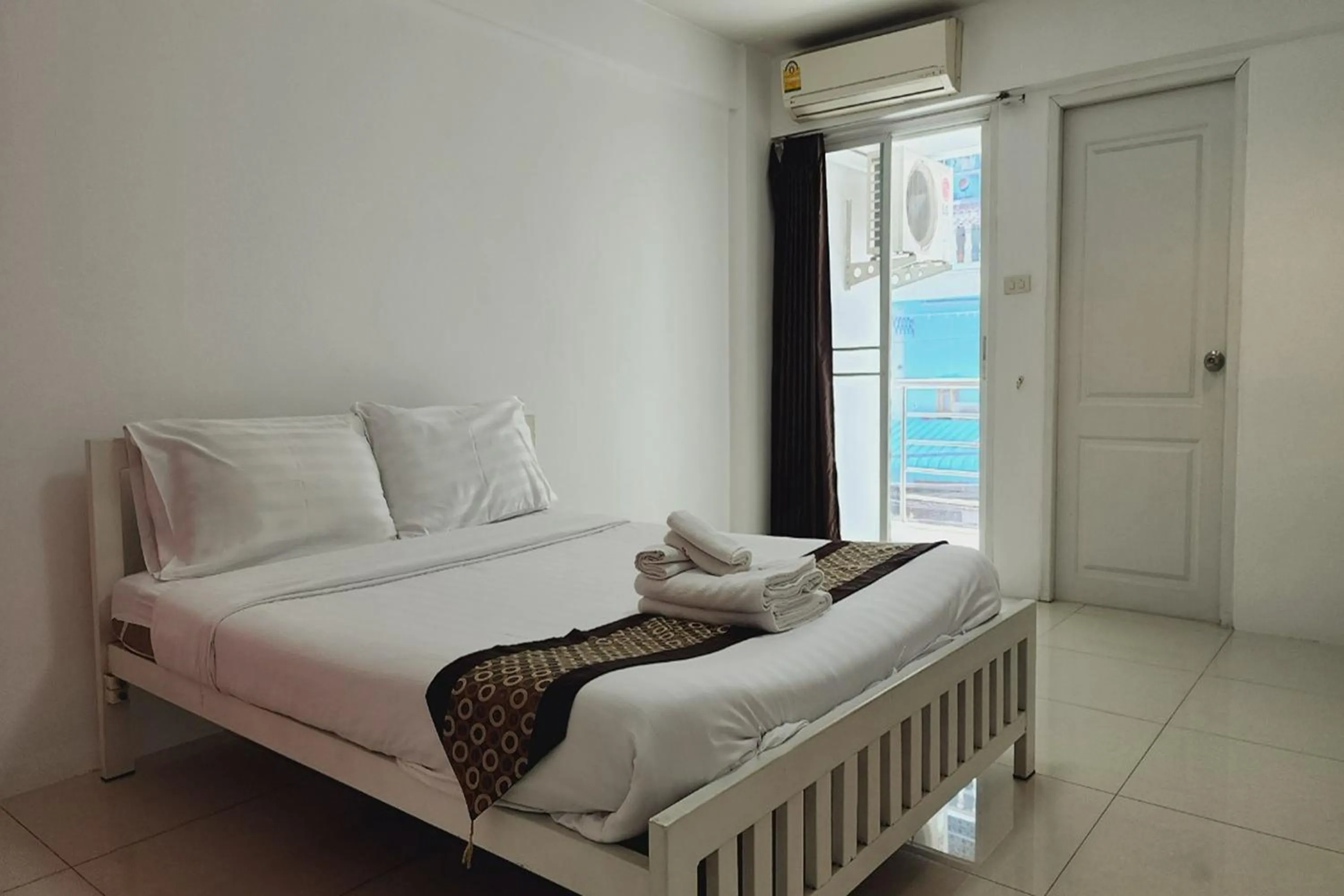 Bed in Zenith Life Hotel