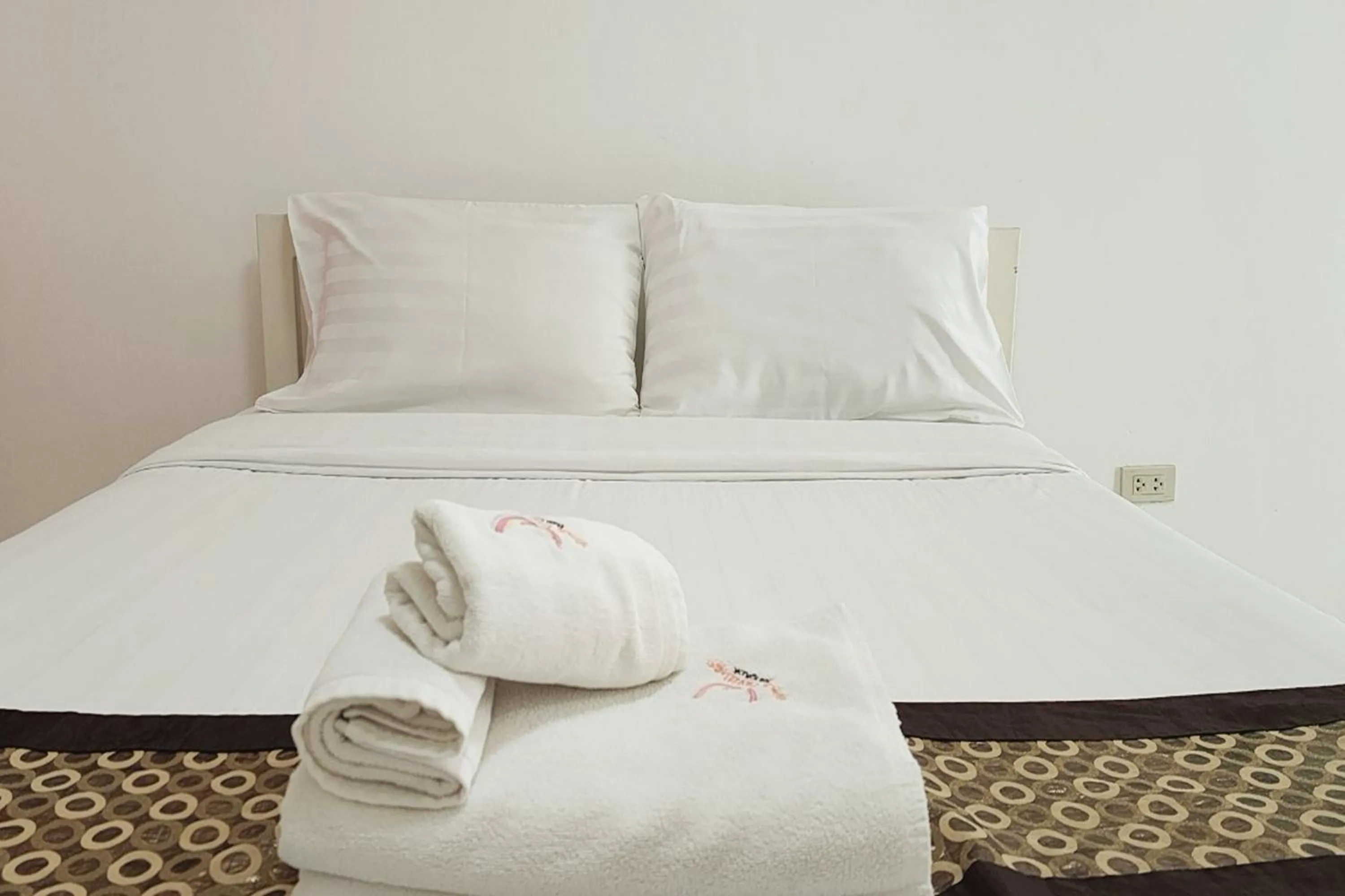 Bed in Zenith Life Hotel