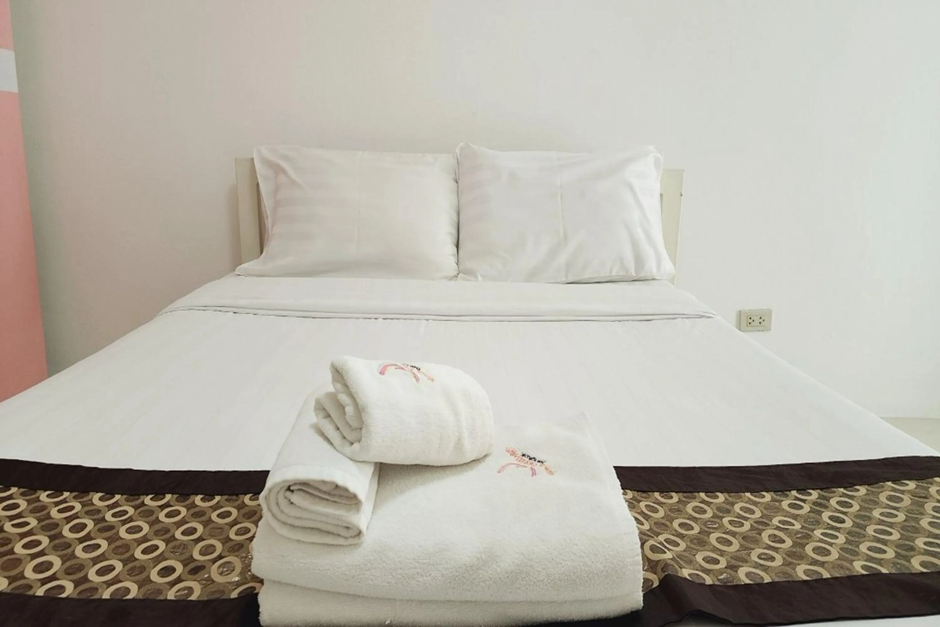 Bed in Zenith Life Hotel