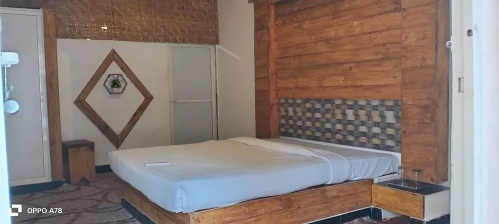 Bedroom, Bed in La Paulo's Back to Basic Beach Resort