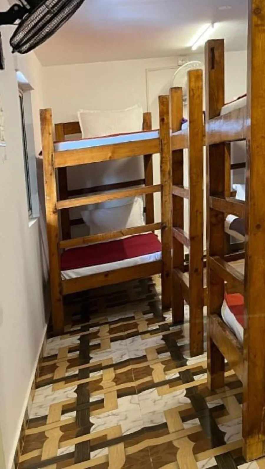 Bed in La Paulo's Back to Basic Beach Resort