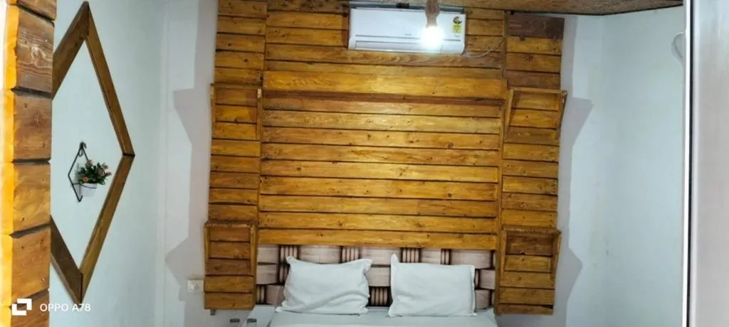 Bed in La Paulo's Back to Basic Beach Resort