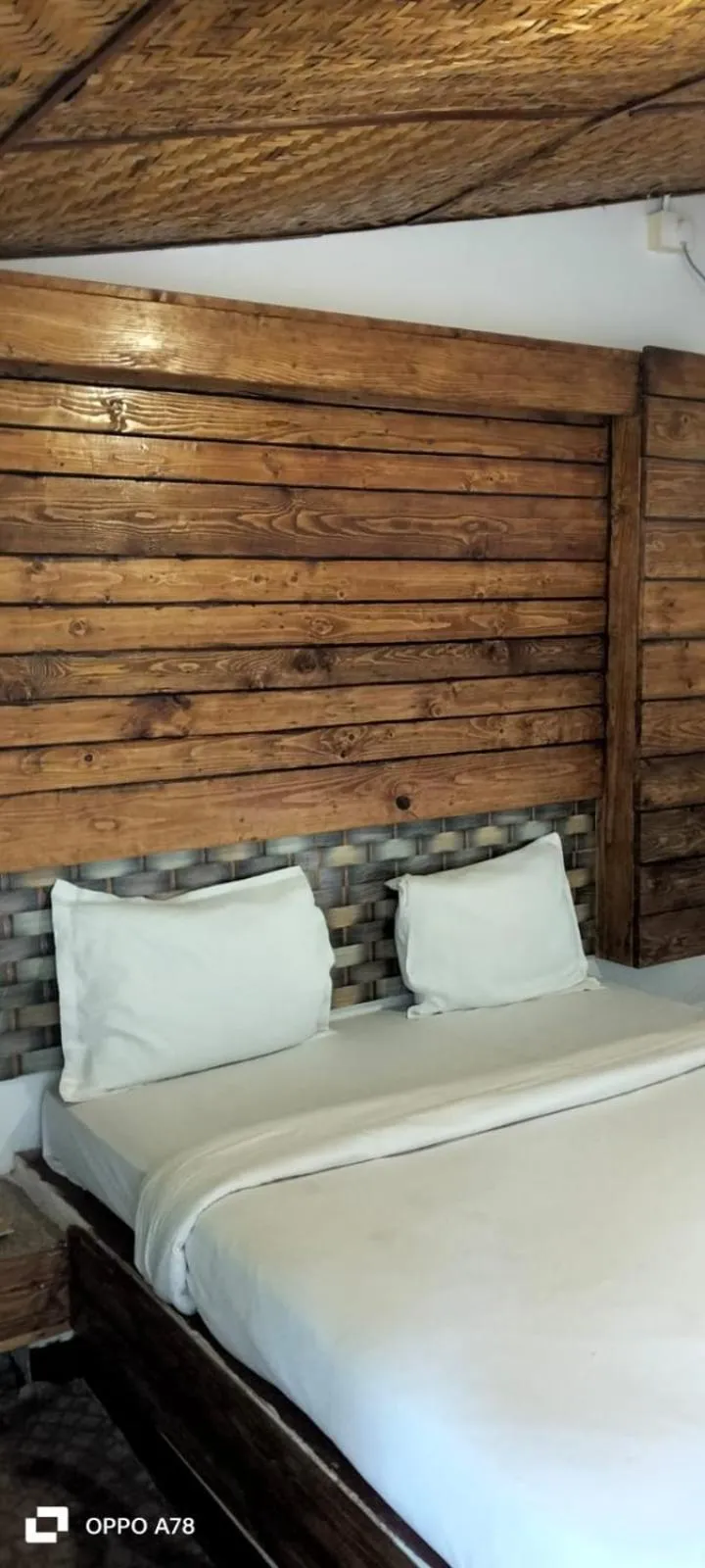 Photo of the whole room, Bed in La Paulo's Back to Basic Beach Resort