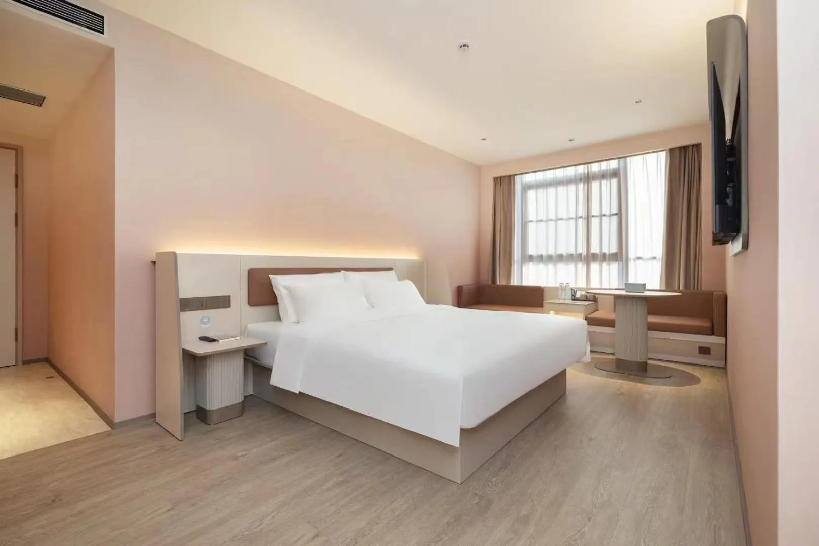 Bed in Hanting Hotel Shanghai Lingang New City Wanda Plaza