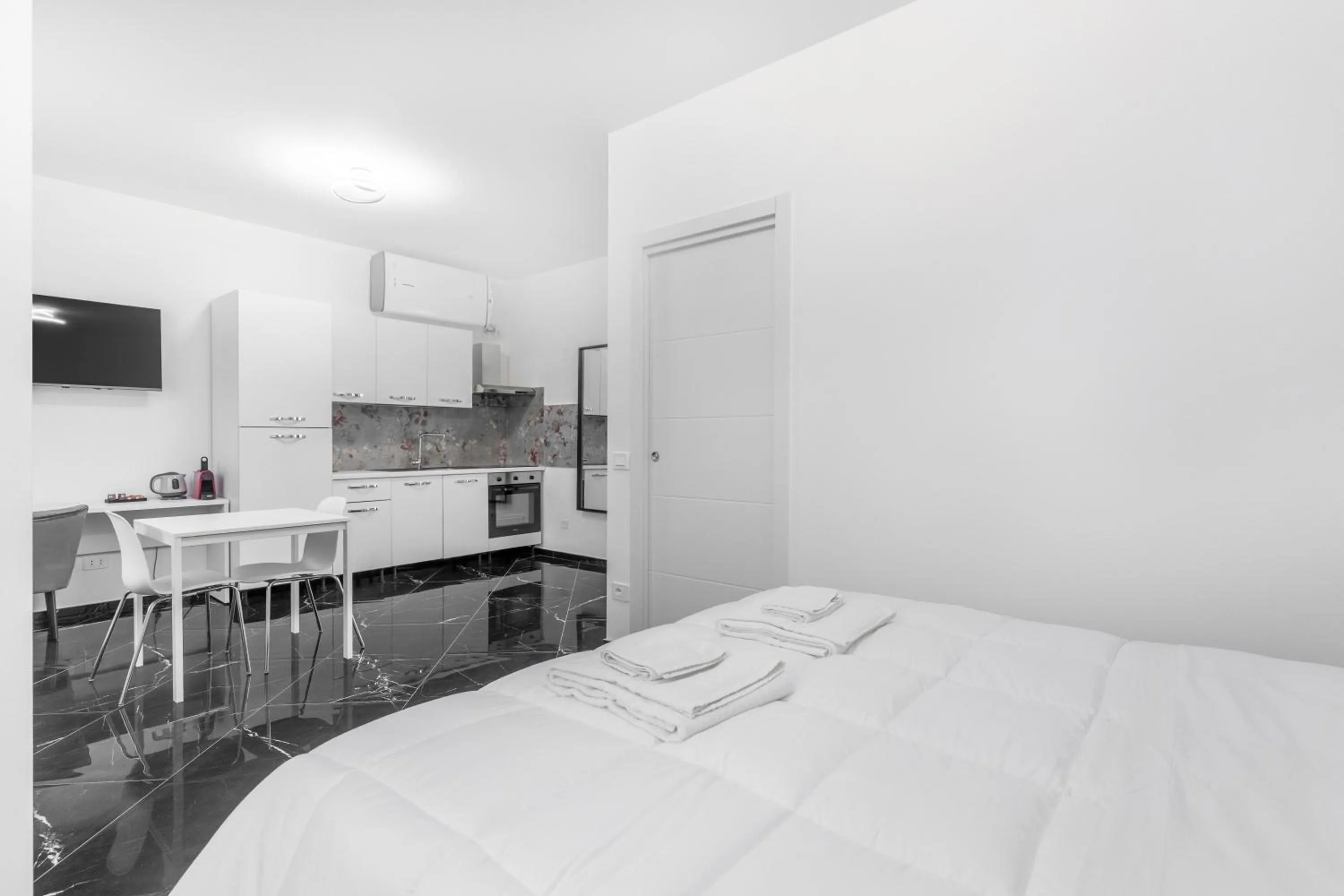 Photo of the whole room, Bed in Ponale Suites Foresteria Lombarda