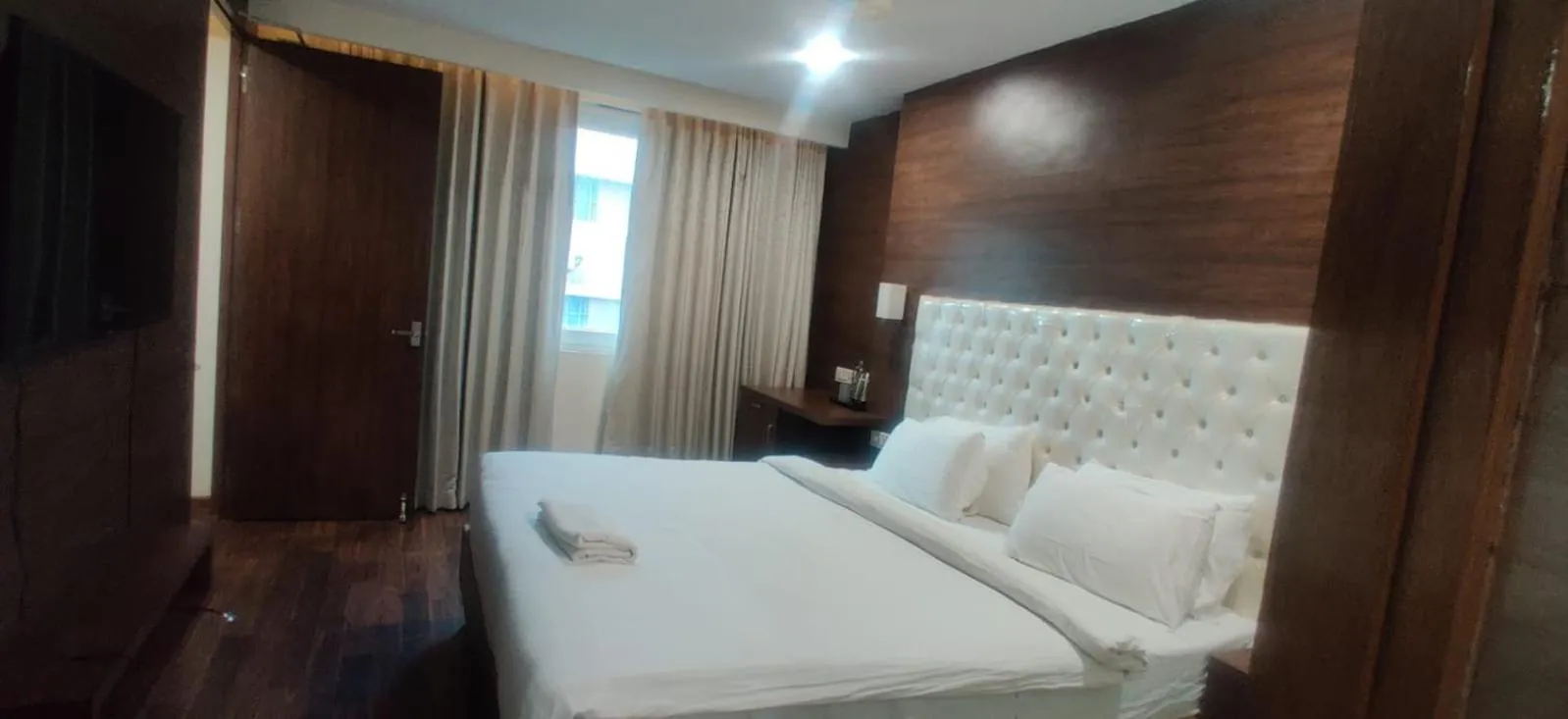 Bed in Hotel RN Grand