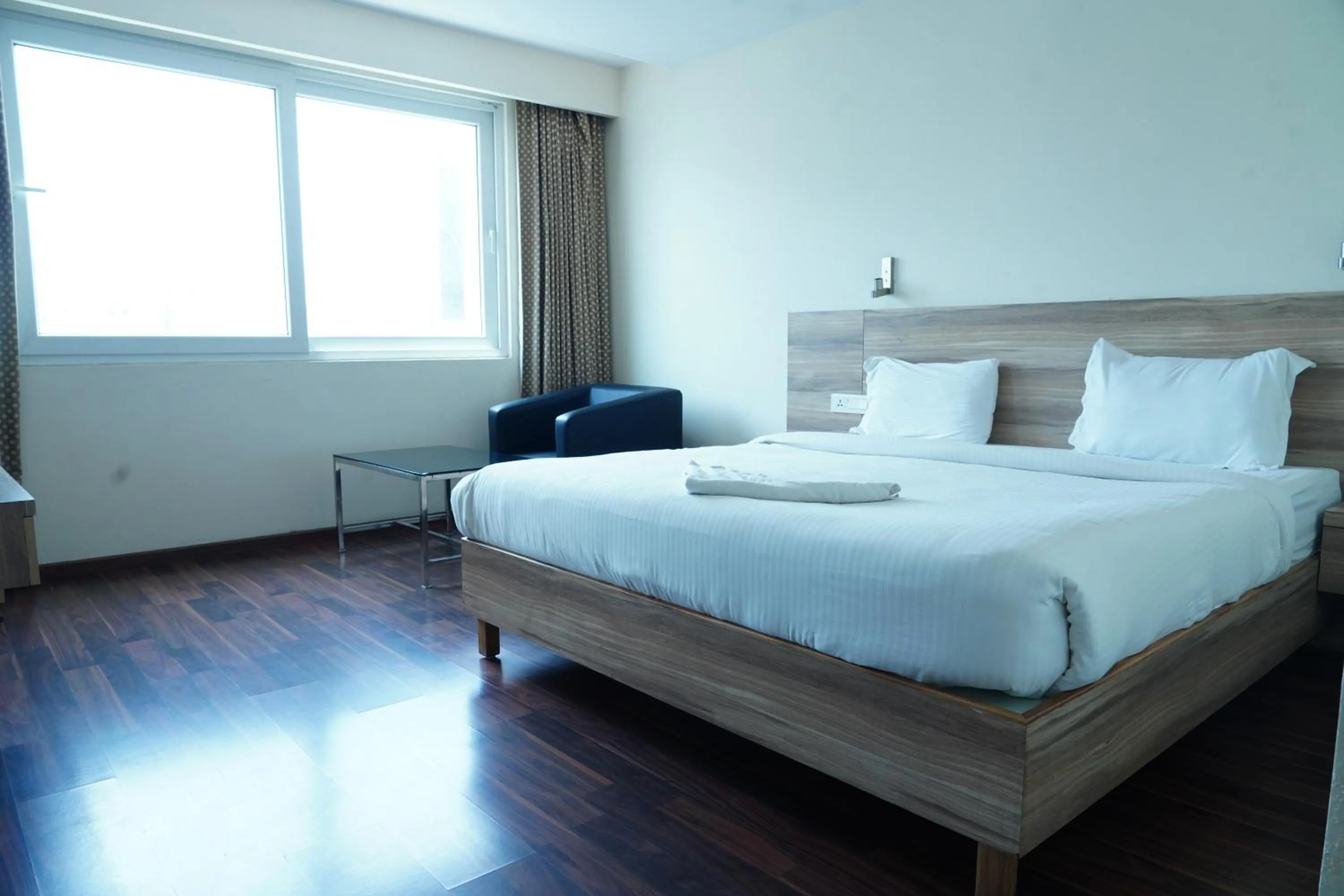 Bed in Hotel RN Grand