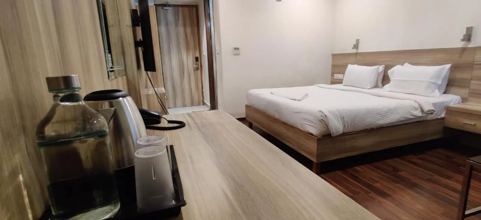 Bed in Hotel RN Grand