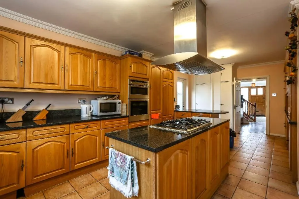 Kitchen or kitchenette in OYO Guest House Ellipse