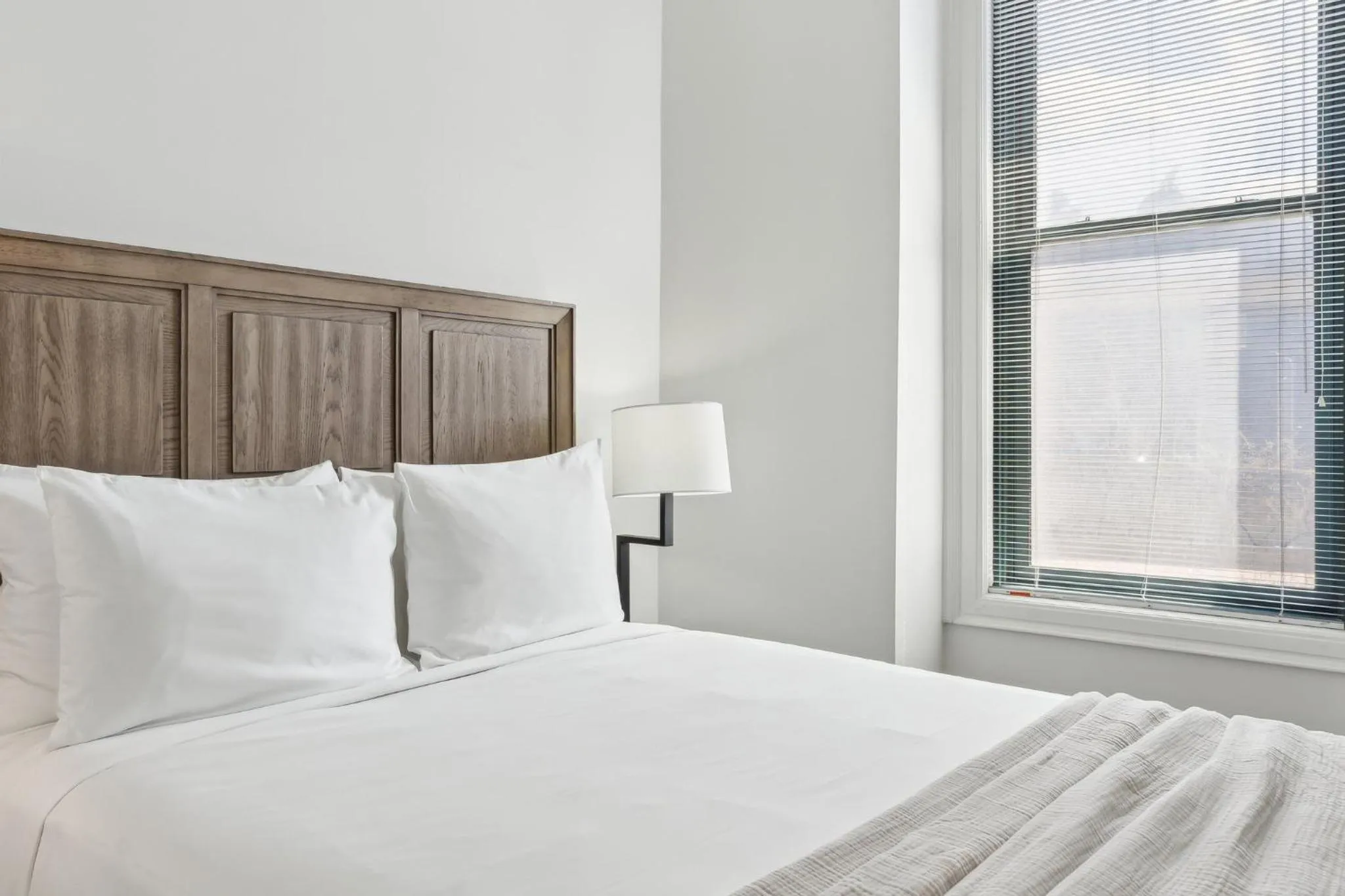 Bed in Placemakr Downtown Pittsburgh at The Pennsylvanian