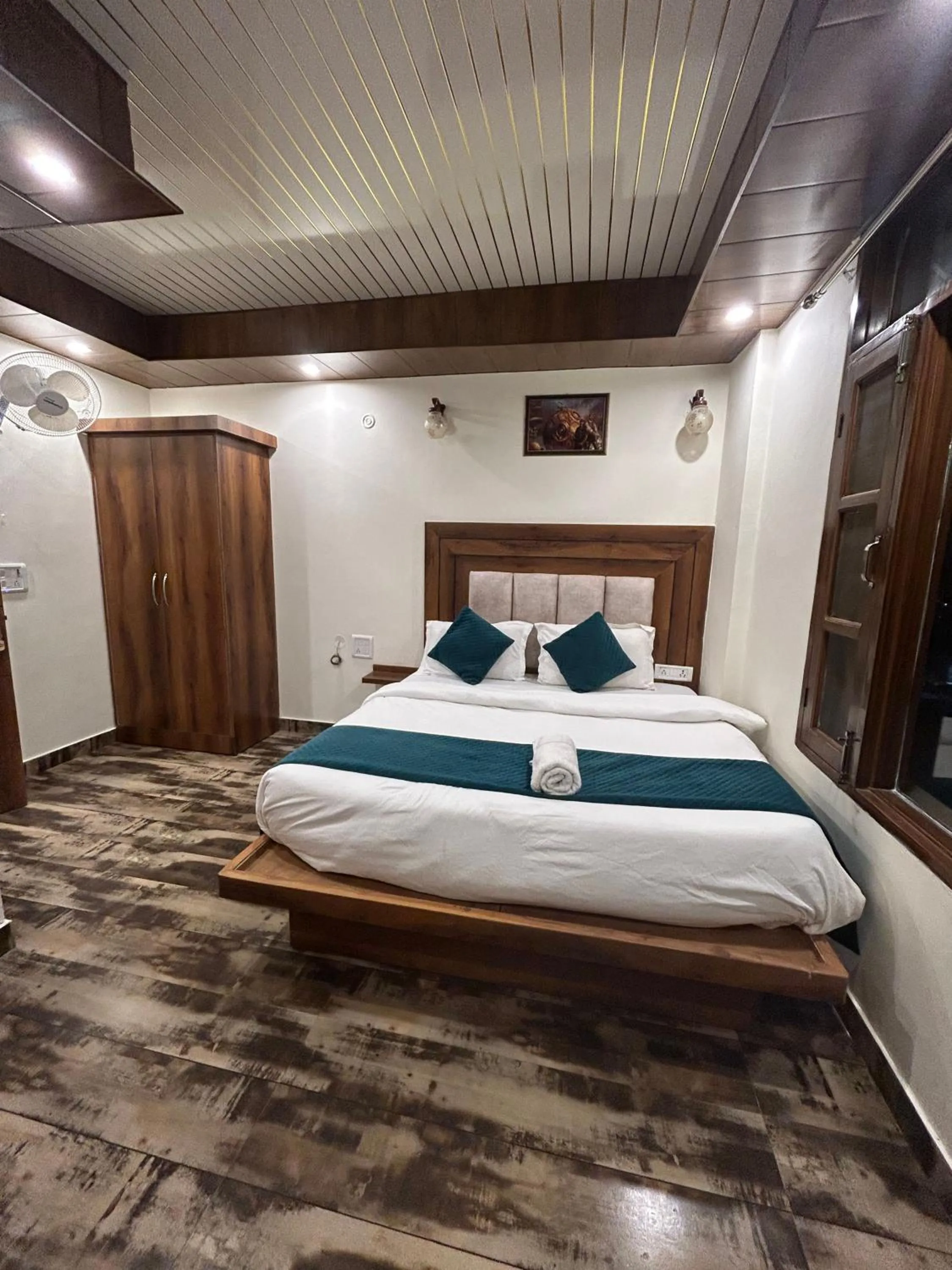 Photo of the whole room, Bed in Hotel Royal Orbit By Arony Hospitality Dehradun