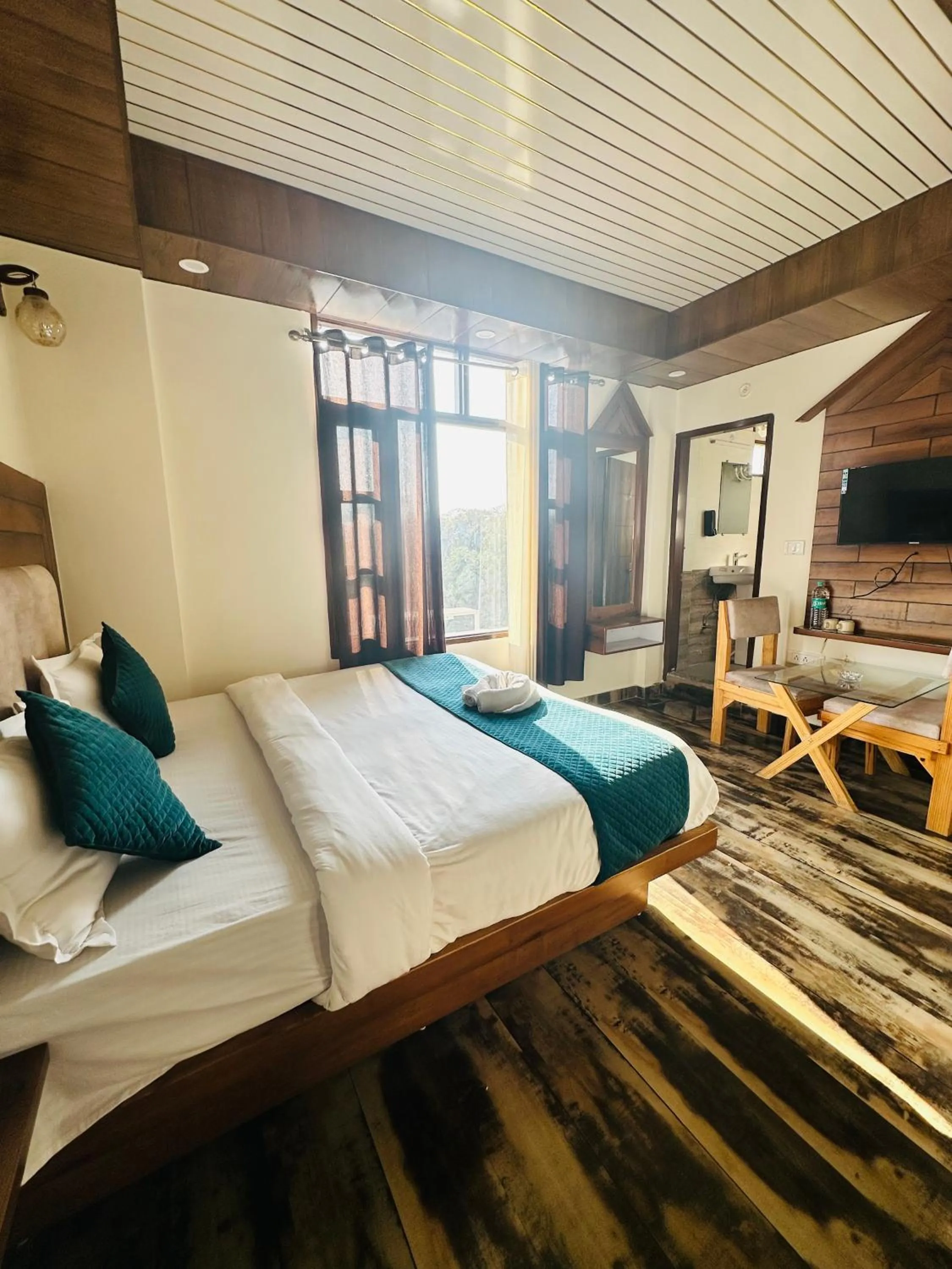 Photo of the whole room, Bed in Hotel Royal Orbit By Arony Hospitality Dehradun