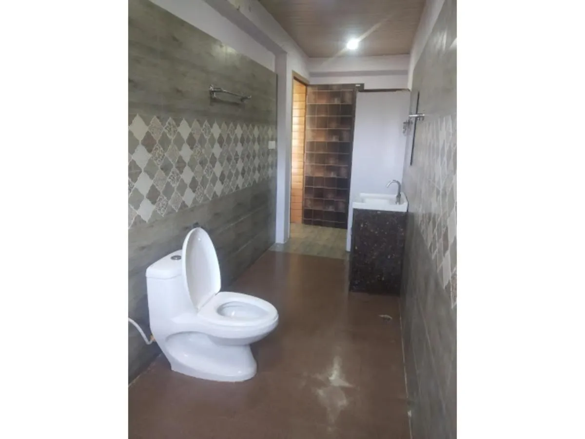 Toilet in The Nature View Resort by Ohana