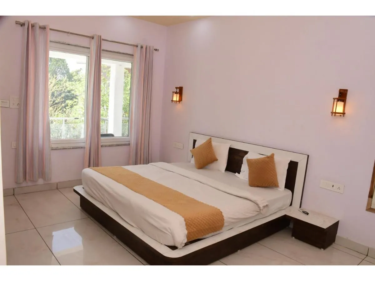 Bed in The Nature View Resort by Ohana