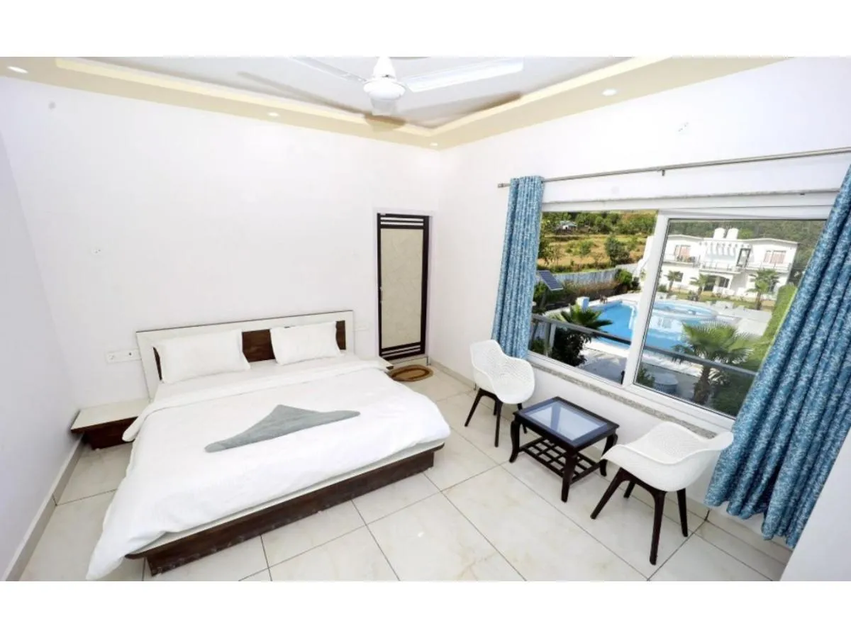 Living room, Bed in The Nature View Resort by Ohana