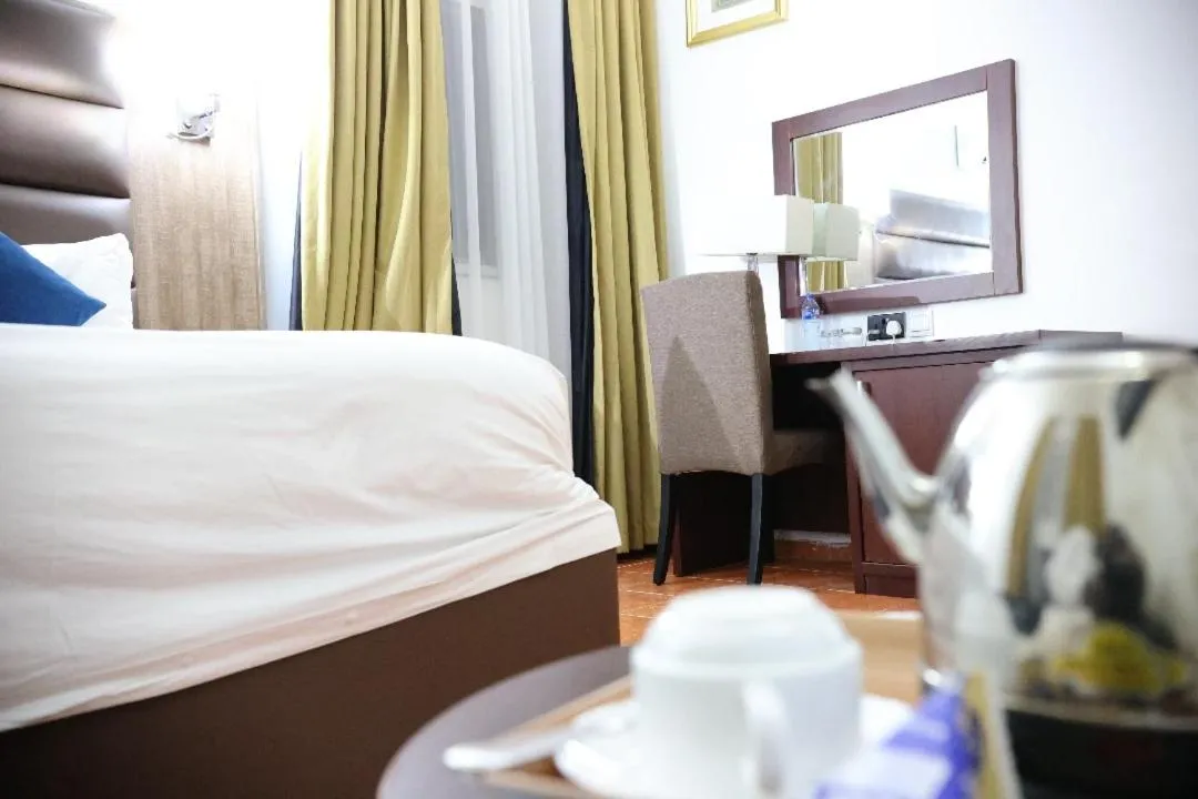 Bed in Bolton White Residence