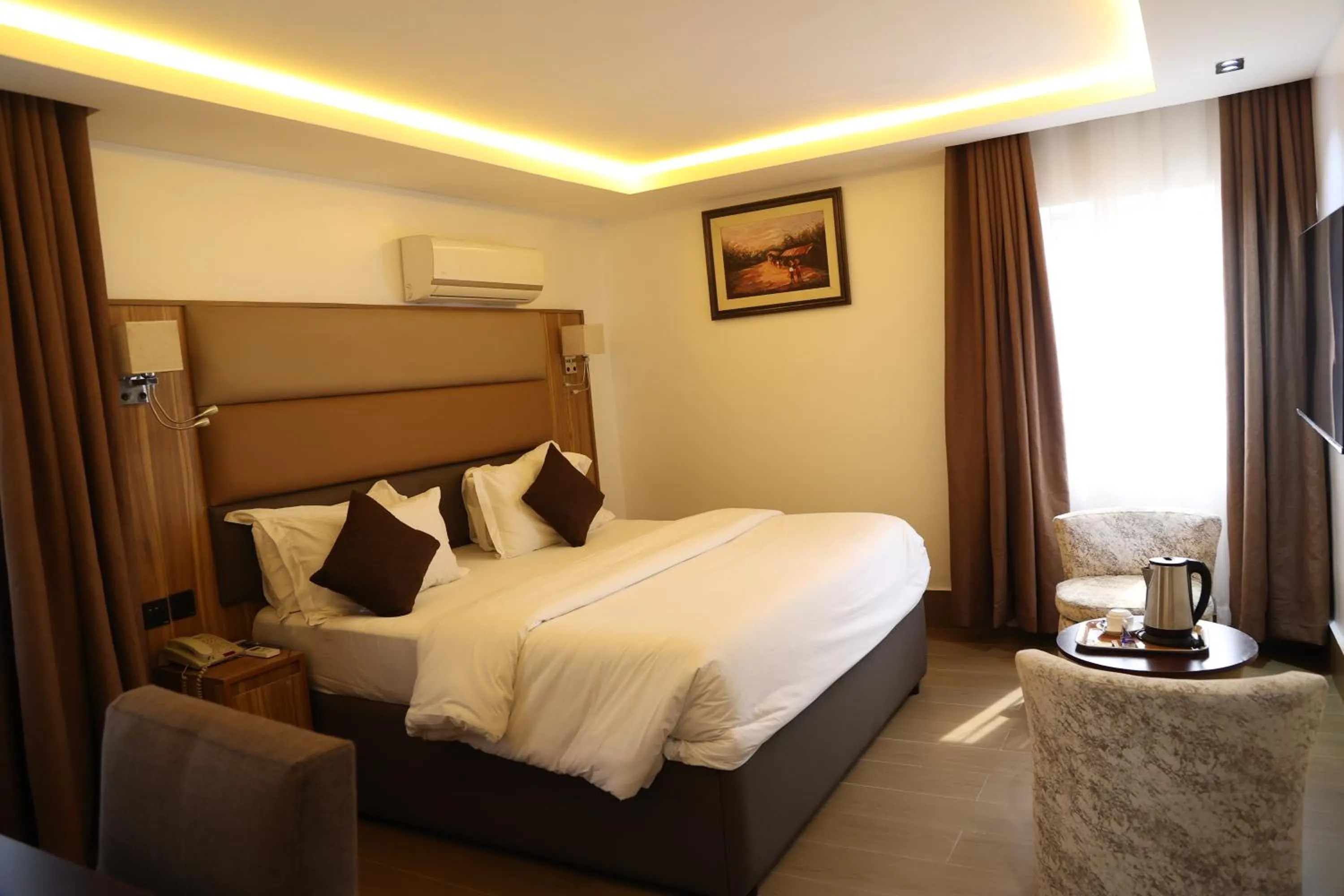 Bed in Bolton White Residence